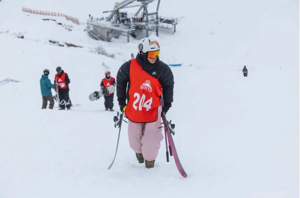 Hiking up the hill in our baggy ski pants