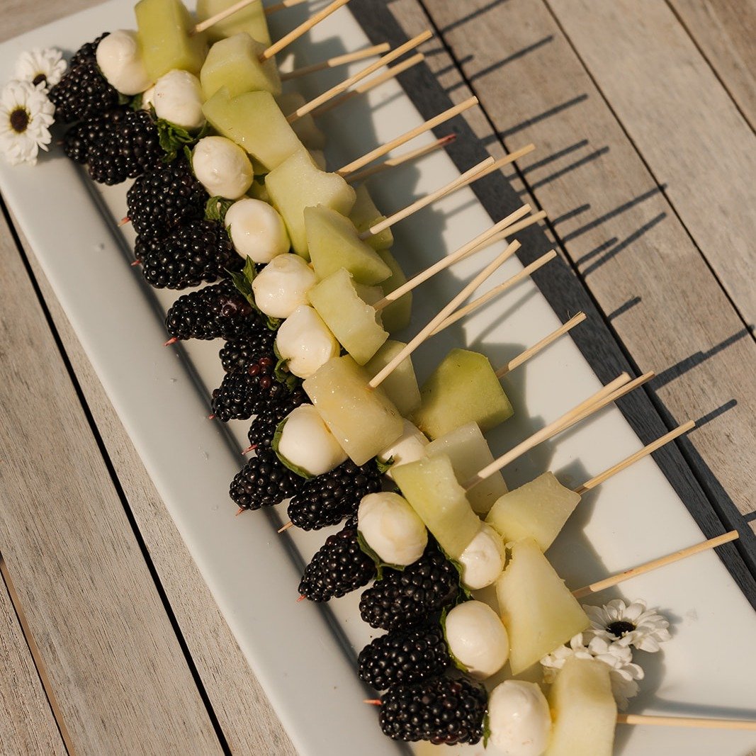 Keep your guests happy and the energy alive with appetizers! They fill the gaps, encourage mingling, and add a touch of flavor to your celebration. A small detail with a big impact! Provide passed apps to elevate your guests' experience. 

Appetizers