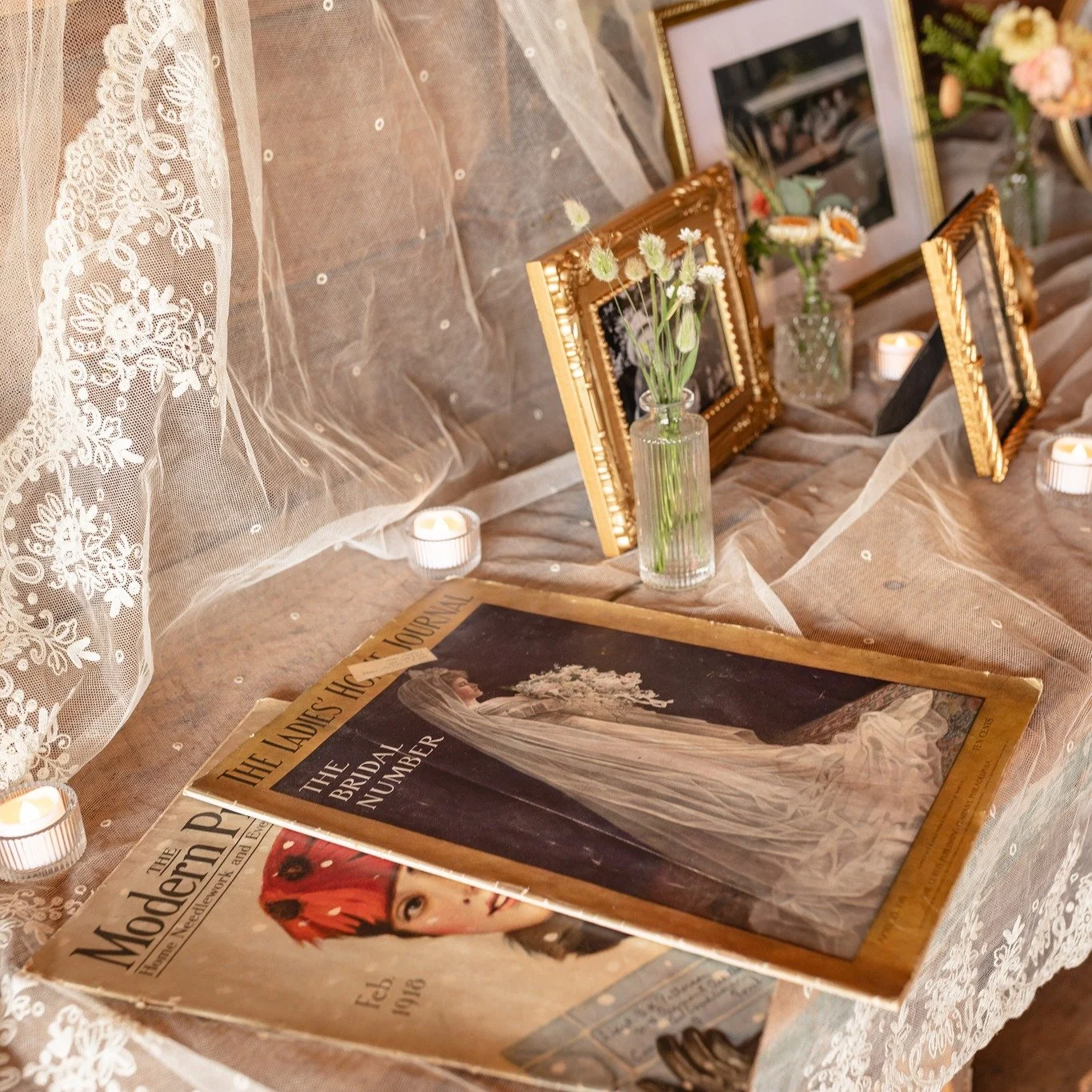 One of our favorite touches from this season, a family heirloom display filled with vintage photos, lace, and love stories that came before. 

These quiet details bring such heart to the barn and remind us what weddings are really about: connection, 