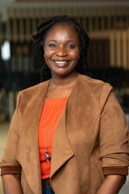 Headshot of Ogho Ikhalo, one of our facilitators that focuses on French language training in the workplace culture