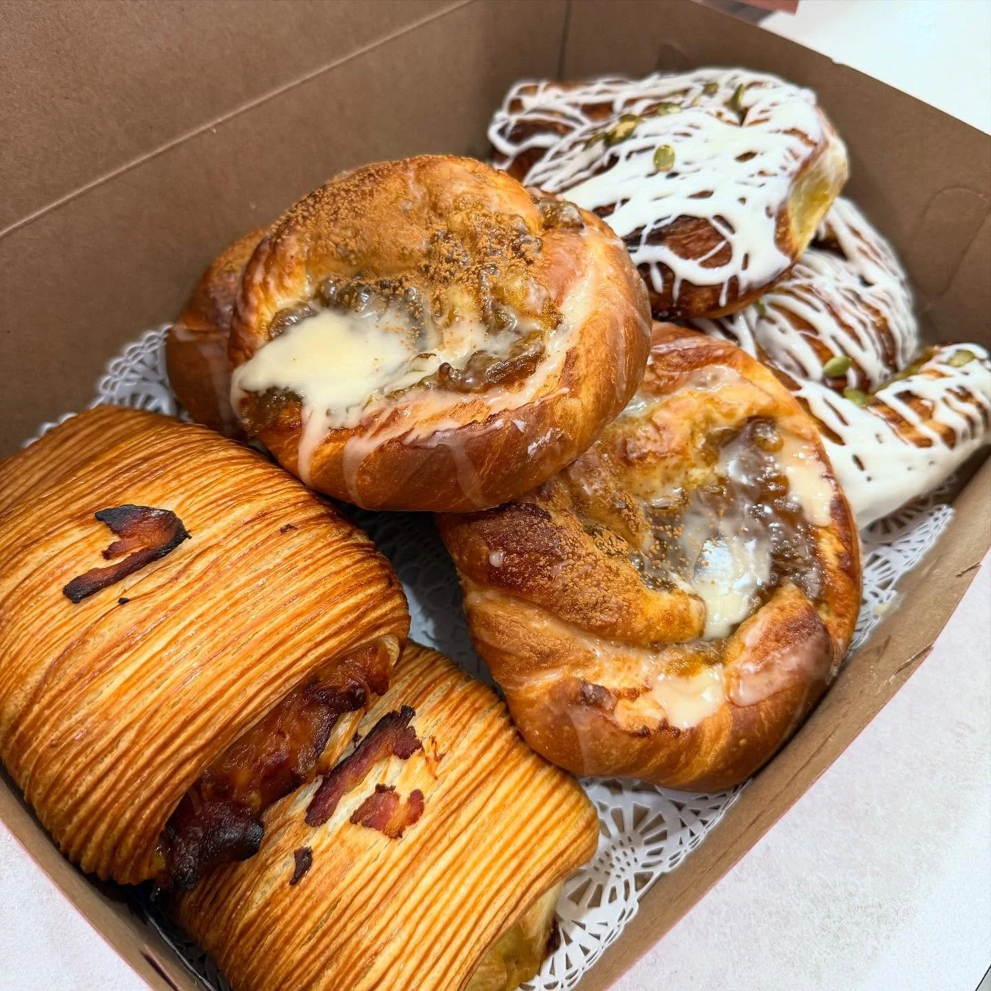 Autumn weekends spent with us 🥐🍁🥐🍁

From left to right: Maple Bacon Caramelized Onion Breakfast Croissant, Apple Butter Brioche Twist, &amp; Pumpkin Cinnamon Swirl 

All three are here for the month of October :)