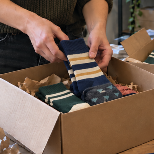 Custom Socks vs. Branded T-Shirts for Company Swag