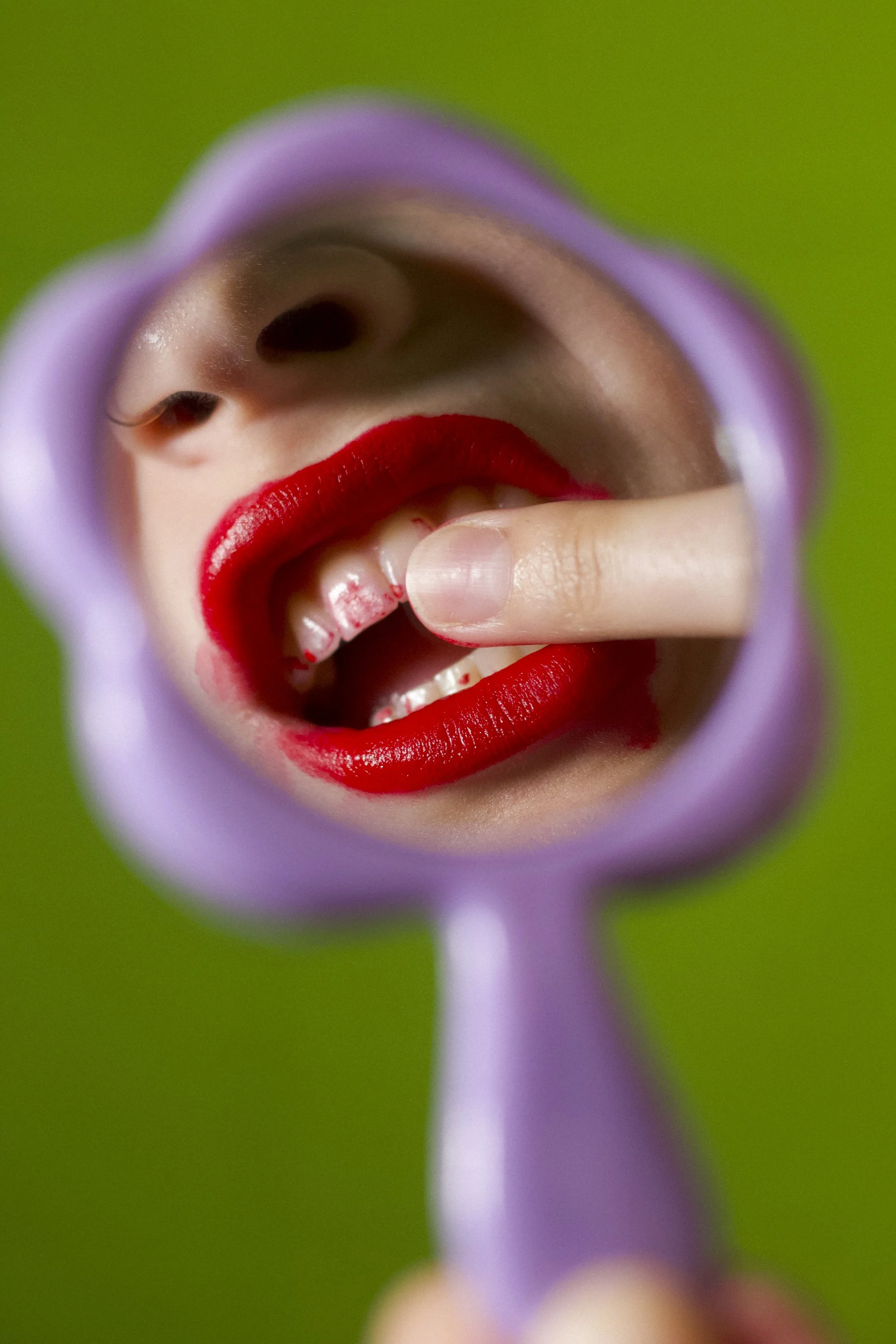 Do I have something on my teeth?