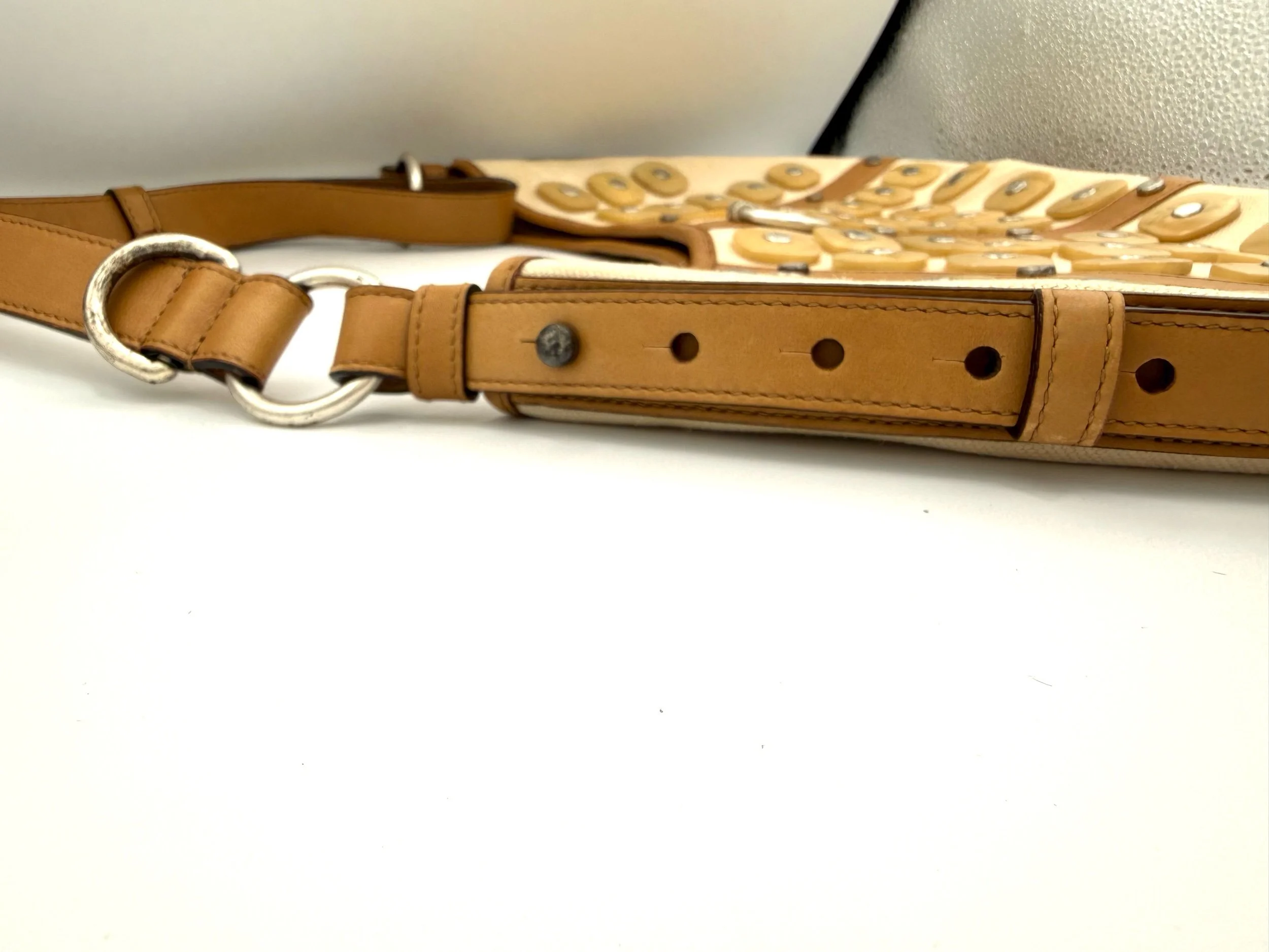 YSL Saint Laurent Grommet Mombasa Side