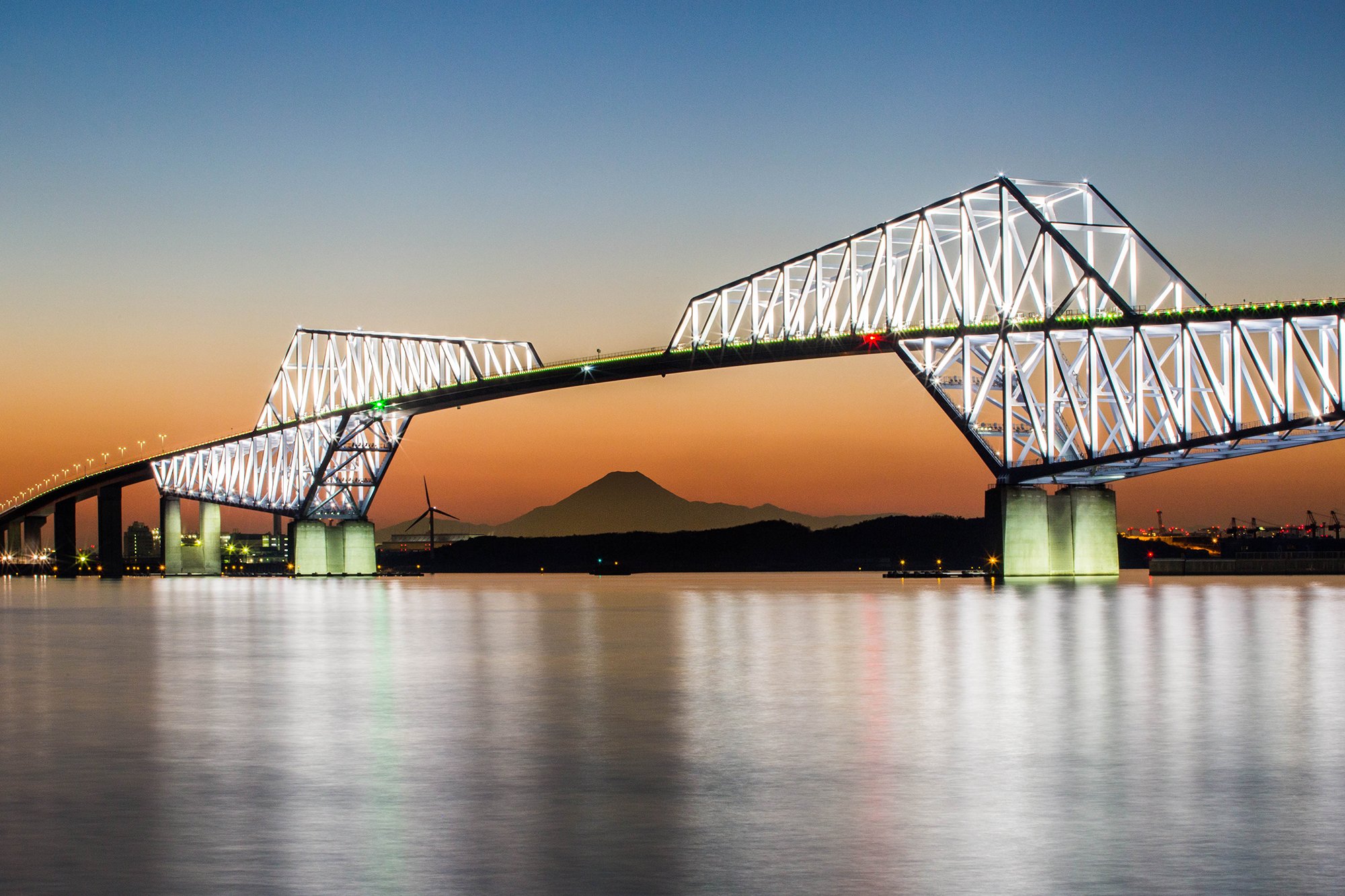 Mt Fuji as viewed through the structure of a bridge over the Arakawa River