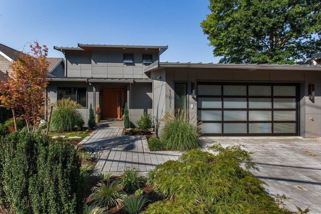 The design of this contemporary high-performance custom home, designed by H2D Architecture + Design, was inspired by the sweeping Lake Washington views from this Kirkland waterfront property.

We focused on creating a seamless connection between indo