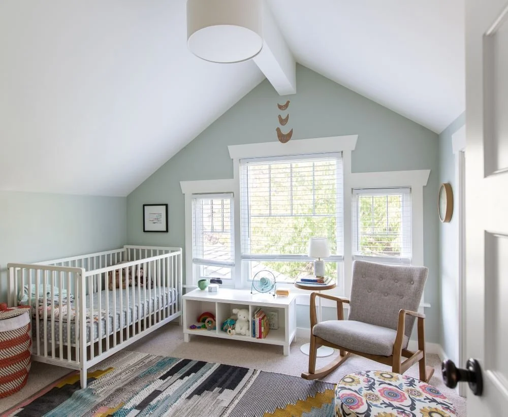 This beautiful nursery was designed as part of a larger renovation project. In H2D's Wallingford Renovation in Seattle, we stripped the home down to the studs and rebuilt with intention. Throughout the project, we aimed to bring the original characte