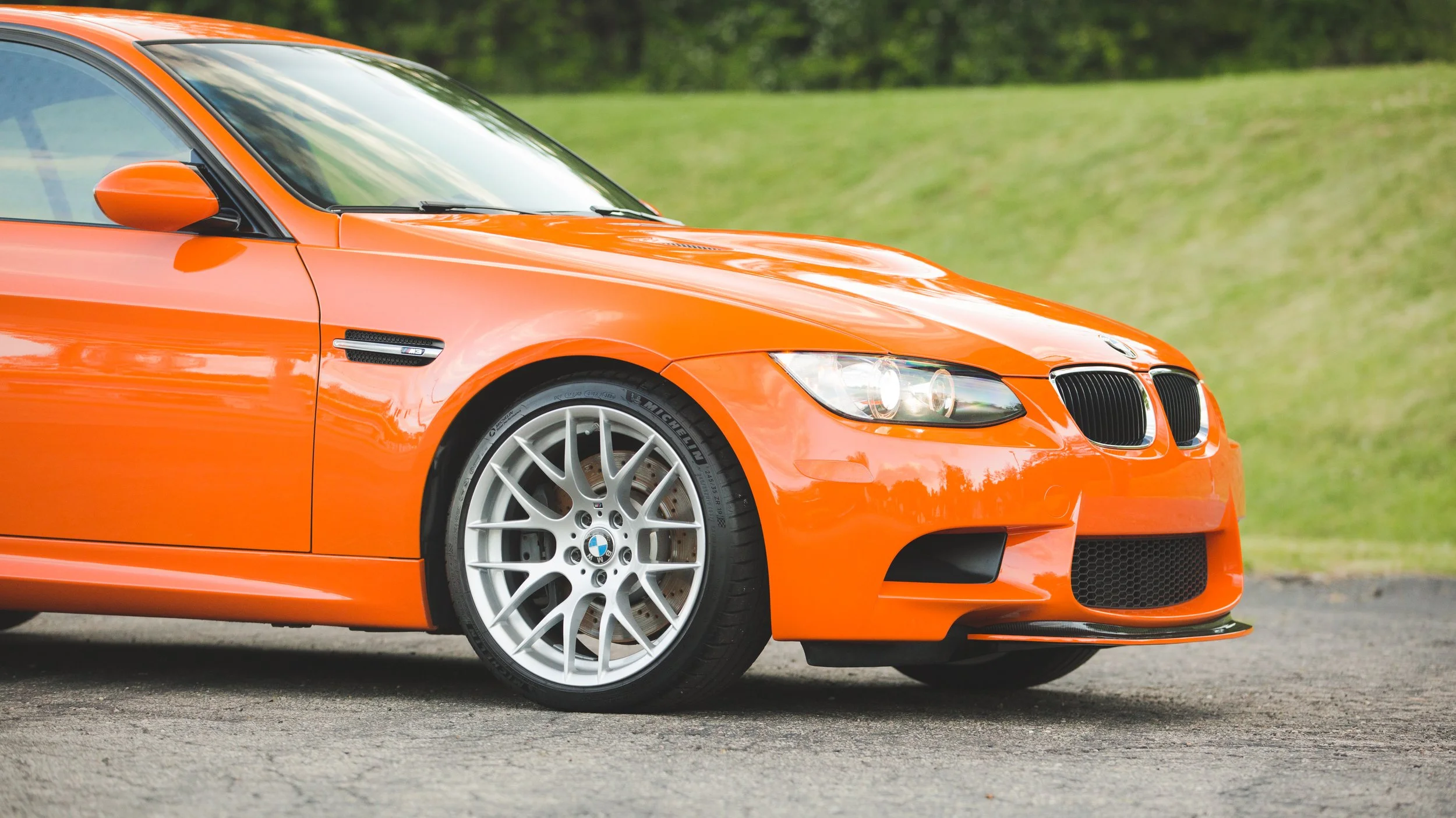 Fire Orange BMW M3 with Pure PPF STEK paint protection film at Provestment USA – premium self-healing protection on classic performance coupe

