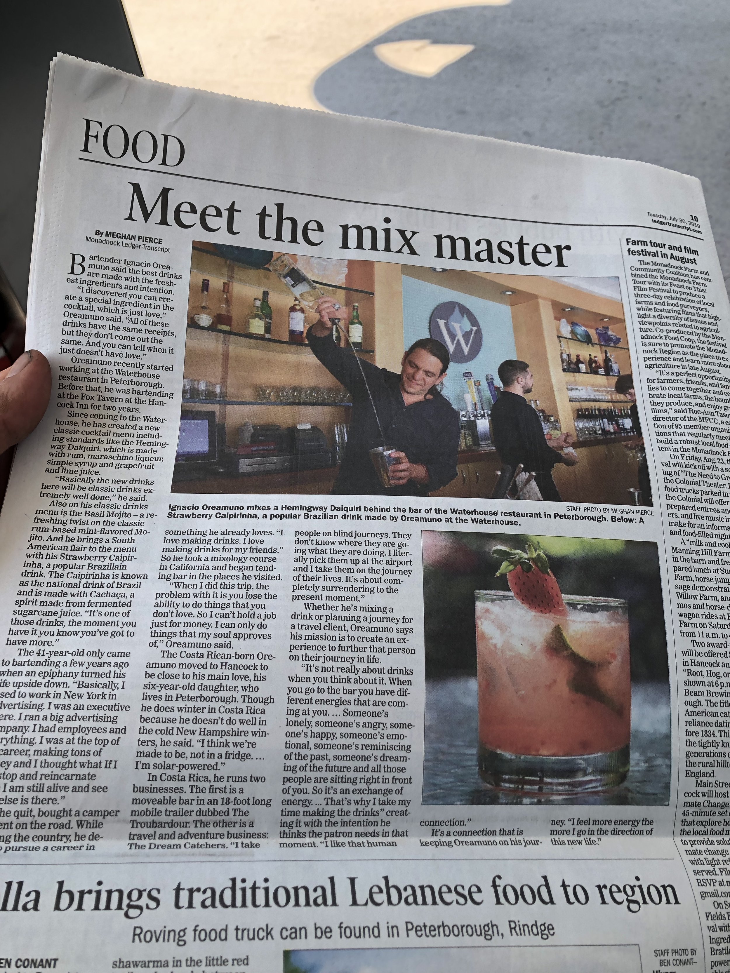 Newspaper article titled 'Meet the mix master' with a photo of a bartender creating a cocktail and another image of a cocktail with a garnish.