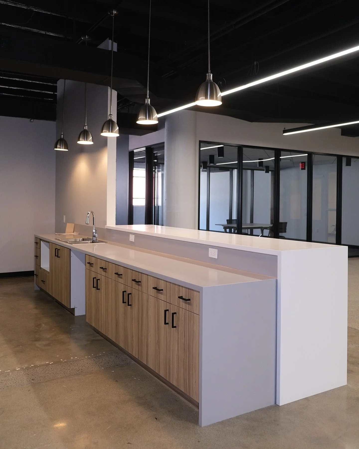 Our #projectoftheweek showcases this sleek, small kitchen layout in downtown Cleveland, featuring custom cabinets, solid surface countertops, and laminated floating shelves! 👍 
.
.
.
#portfolio #kitchendesign #kitchenrenovation #custommade #complete