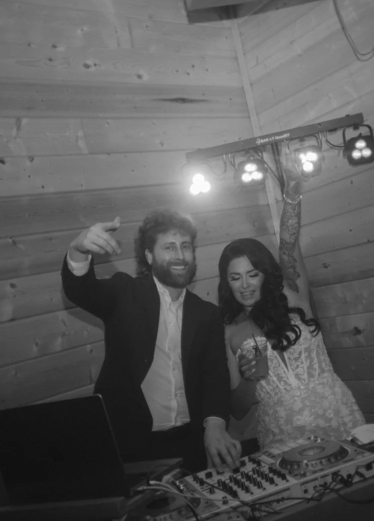 Kaylee and DJ Tyler Osborne Behind DJ Booth.JPG