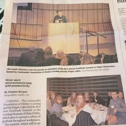 Coach Filomena newspaper.jpg