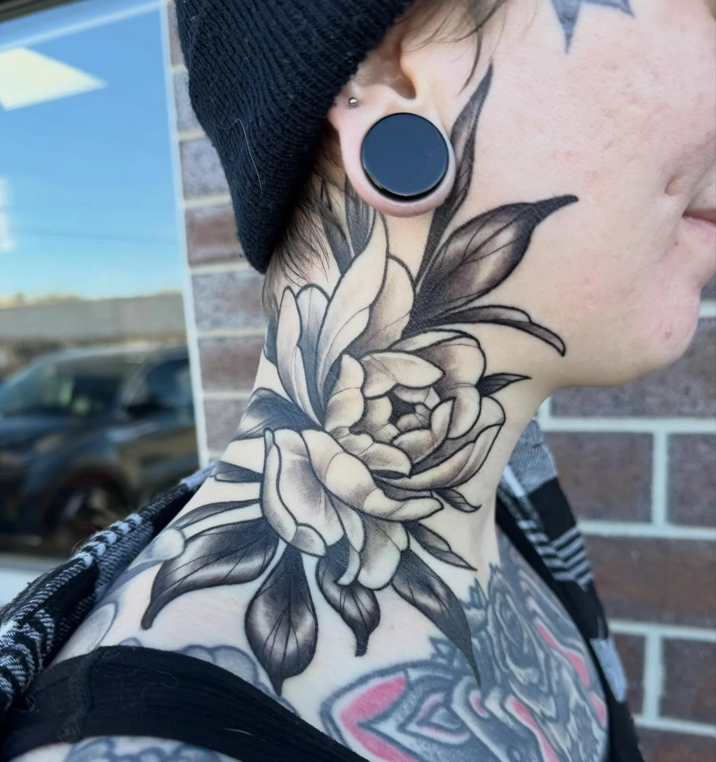 So much fun with this peony neck tattoo. It&rsquo;s the first side of my dear coworker @kelseylouistattoos neck, done at the beginning of the year. Can&rsquo;t wait to do the other side next!!! .
.
.
.
.
.
.
.
.
. 
. #iowacity #tattoos #iowacitytatto