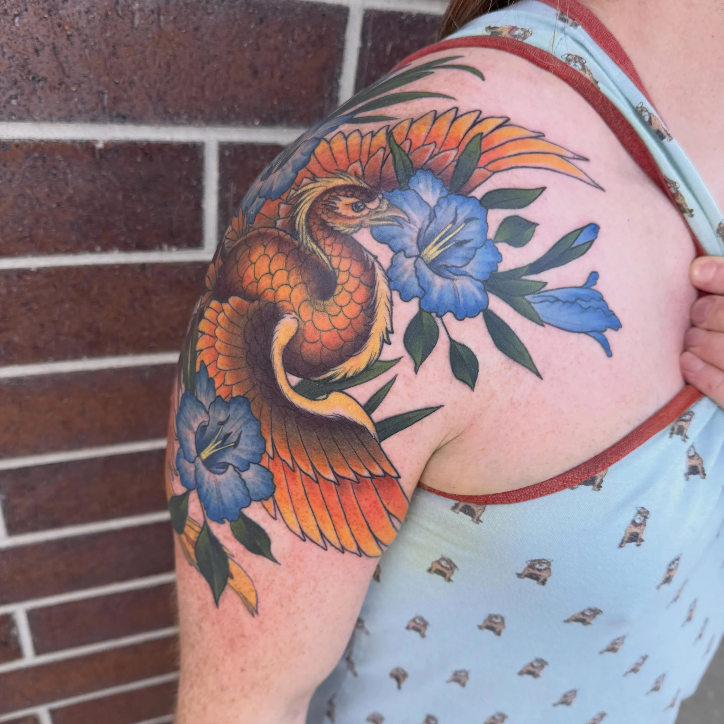 Finished up this lovely phoenix and gladiolus tattoo earlier this year &hearts;️ 🐦&zwj;🔥 💐 &hearts;️ .
.
.
.
.
.
.
.
.
. 
. #iowacity #tattoos #iowacitytattoos #tattooartist #iowatattooartist
