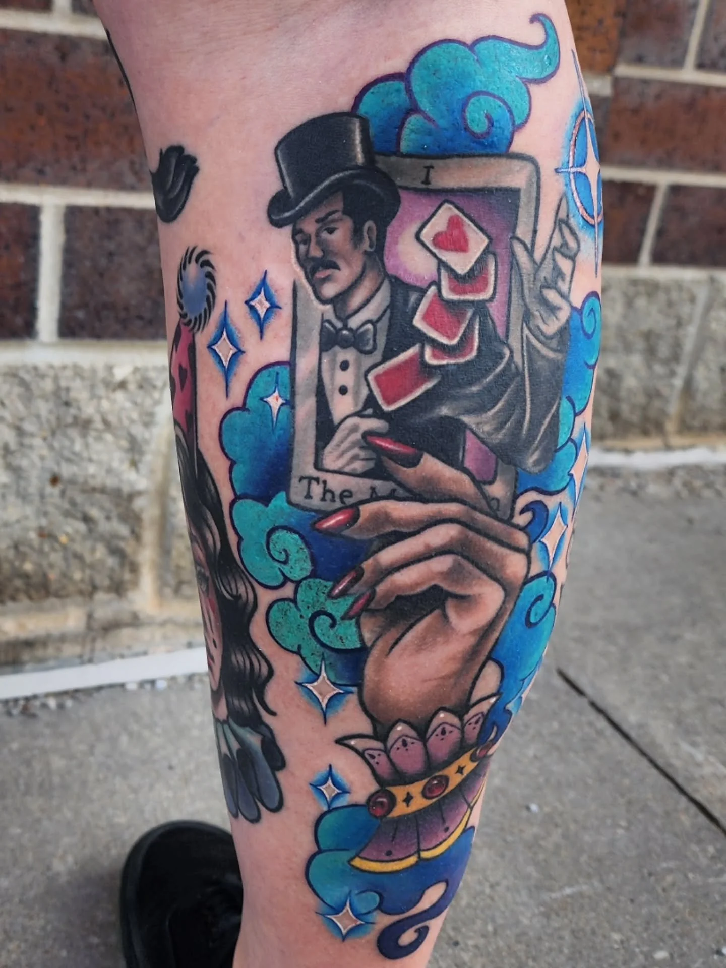 A couple tattoos from recently. Added some mystical smoke behind the hand holding a tarot card I did around 10 months ago. 
And a nose boop print 🥰