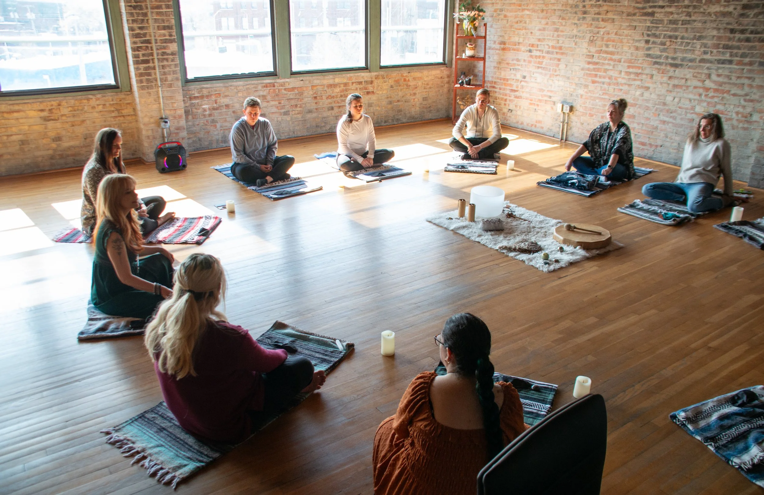 Group of people learning how to become breathwork facilitators