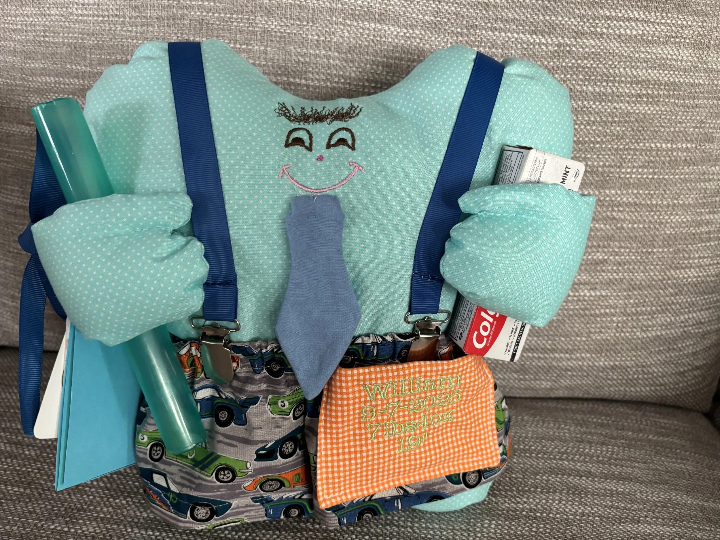  tooth pillow pal with tie and shorts