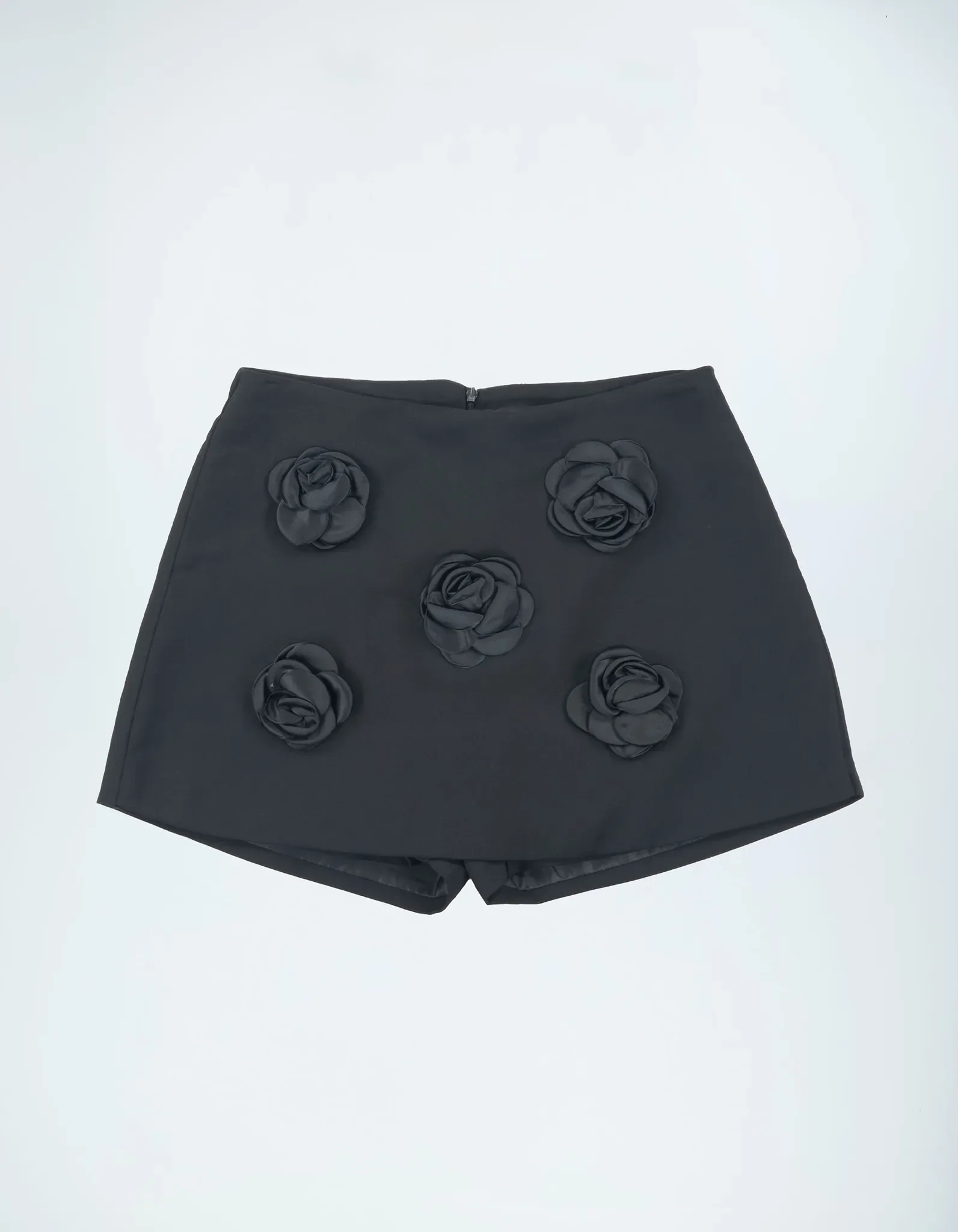 Schwarze Shorts Frontansicht 3D-Blüten.