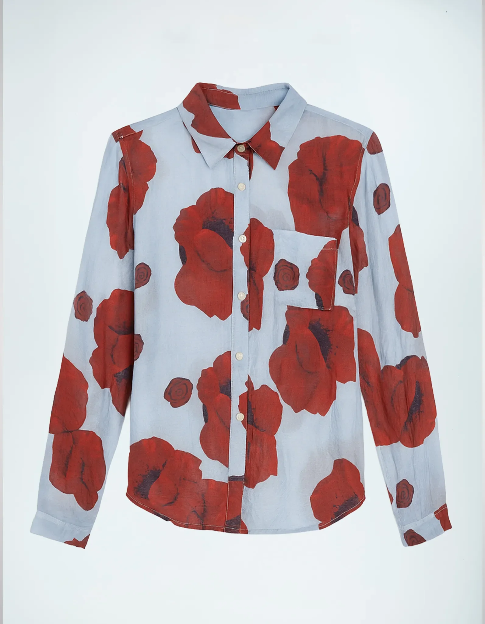 Vorderansicht der Flora Bluse mit Mohn-Muster.