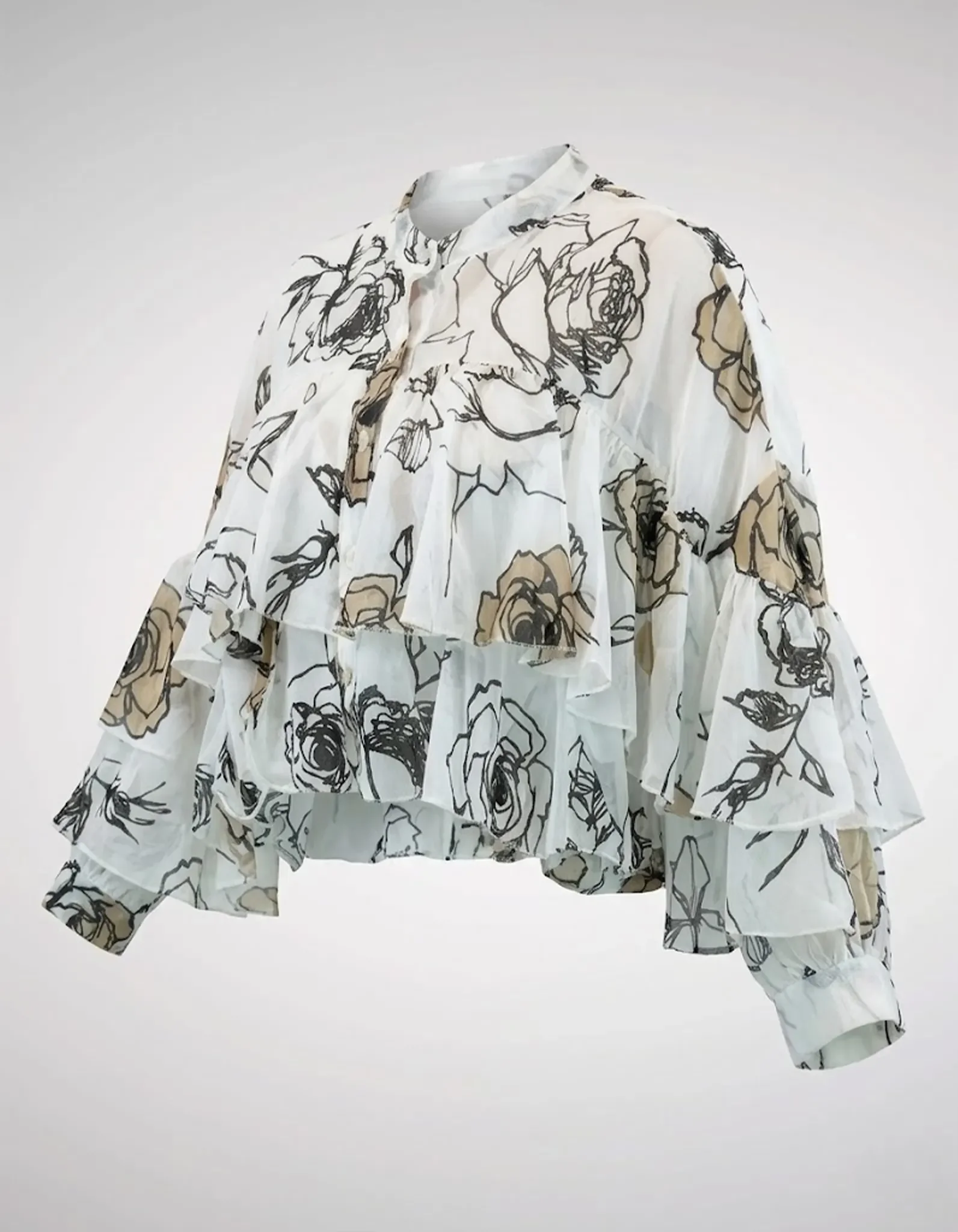 Weiße Rüschenbluse mit Blumenmuster freigestellt
