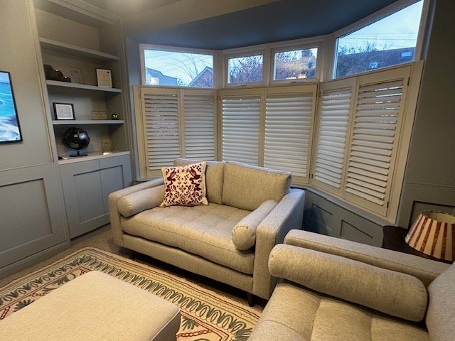 living room with evolve blinds fitted plantation shutters