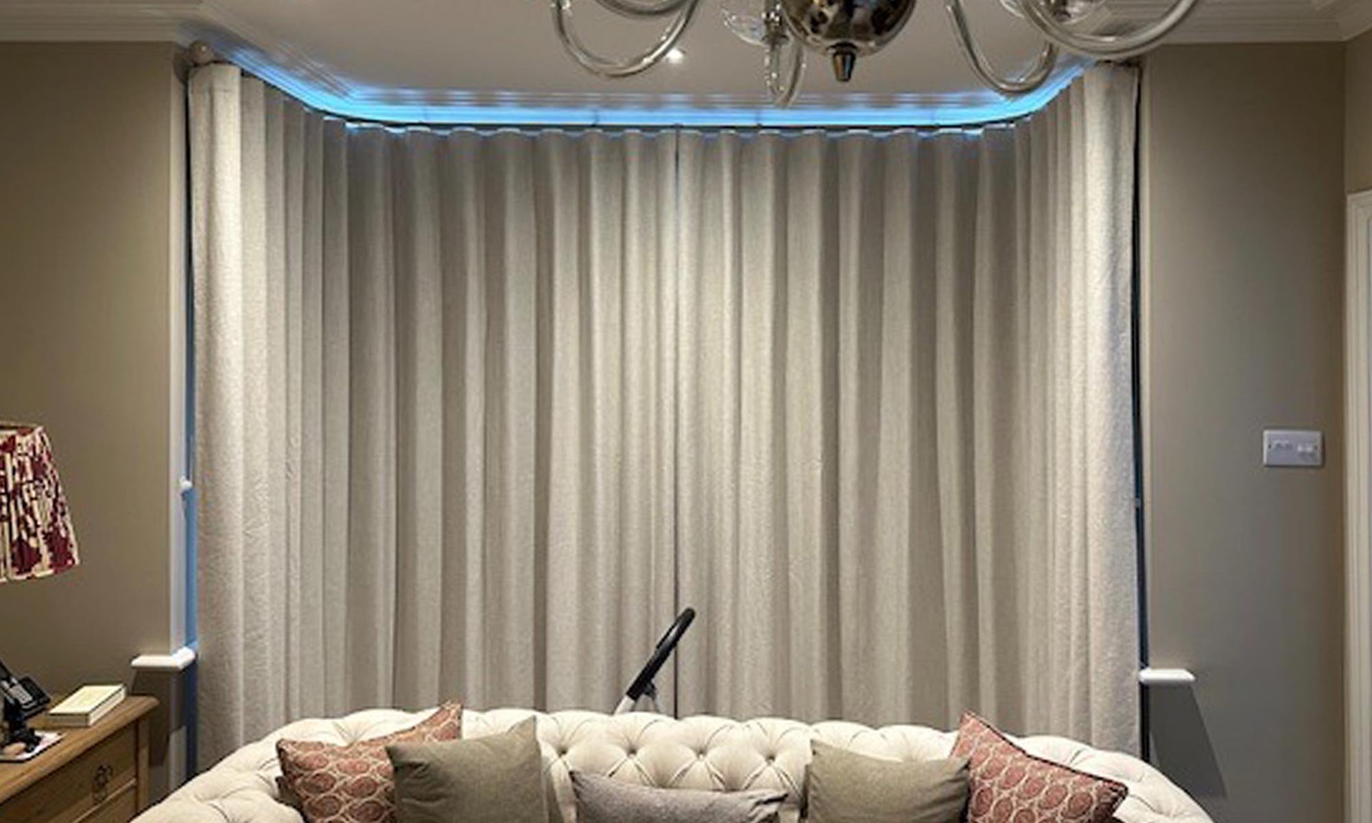 wave headed curtains pulled to keep the cold out