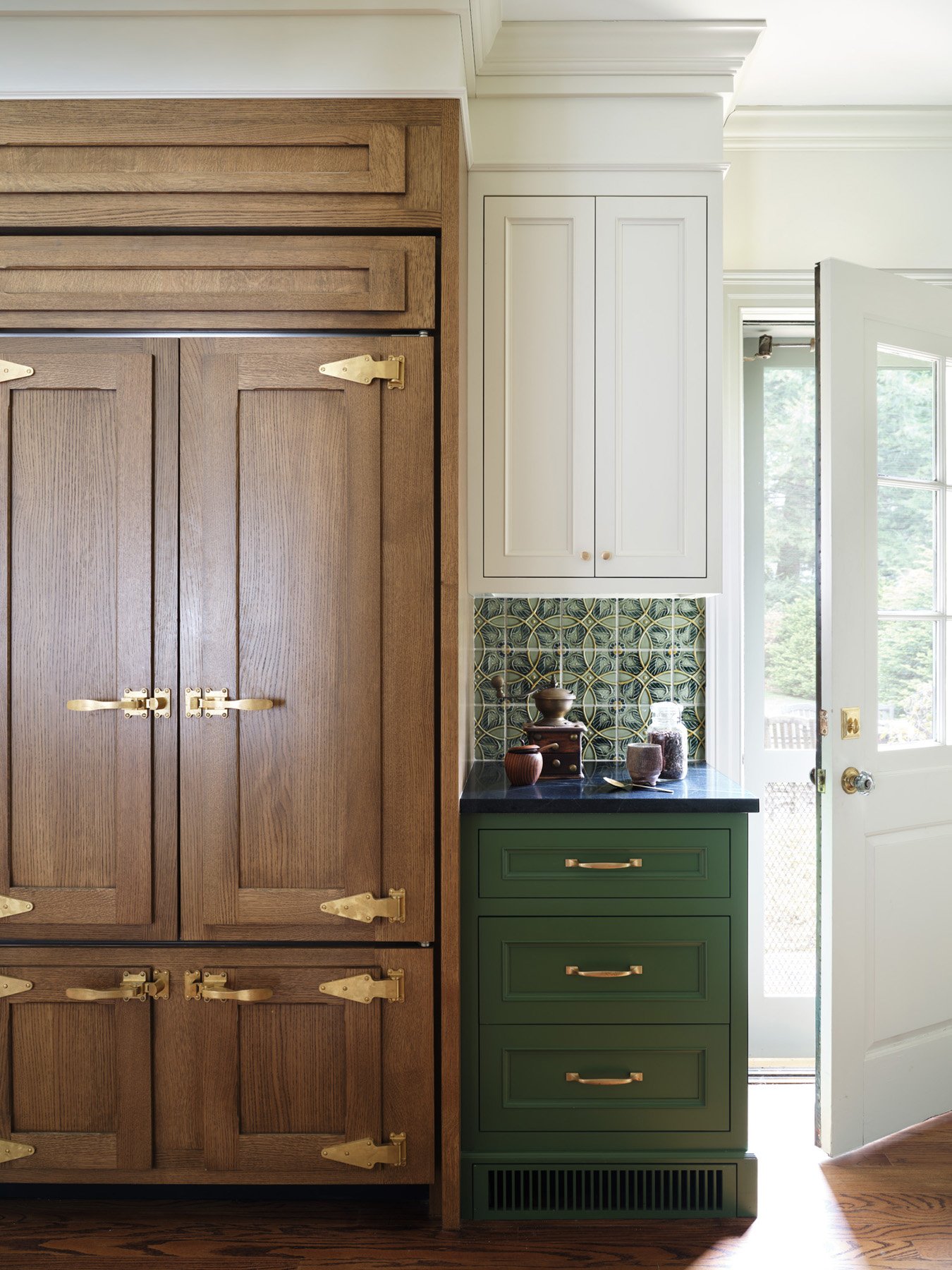 SACRIS paneled Sub-Zero refrigerator with custom brass strap hinges and latches, detailed as a tribute to the estate original icebox, Nashua New Hampshire