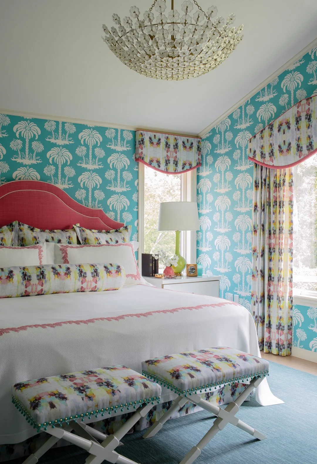 Sacris Design Portsmouth New Hampshire colorful primary bedroom with coral upholstered headboard, tree wallpaper and ikat drapes, New Castle NH