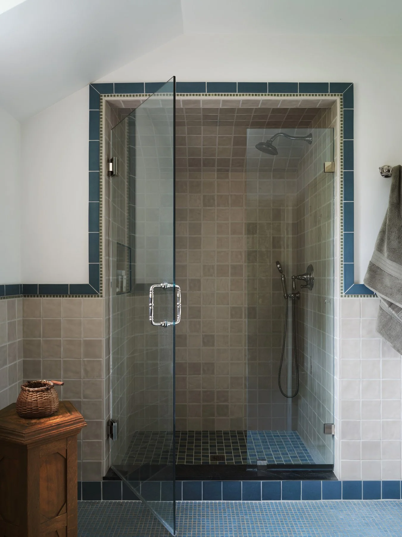 SACRIS bath shower with frameless glass, taupe field tile, blue tile border and mosaic floor, Nashua New Hampshire
