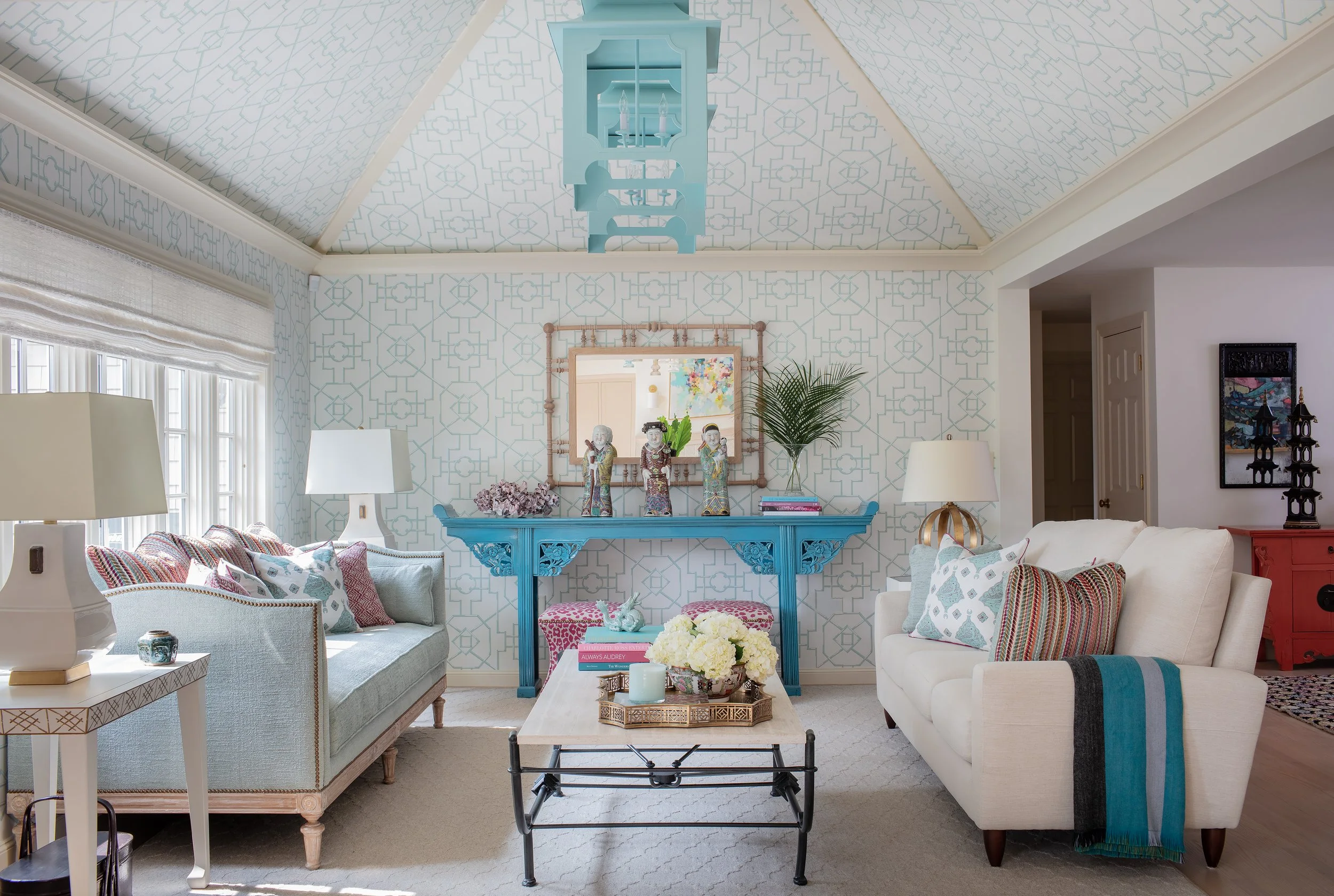 Sacris Design coastal New Hampshire living room with full hipped ceiling covered in trellis wallpaper, turquoise chinoiserie console and custom lantern pendant, New Castle Portsmouth NH