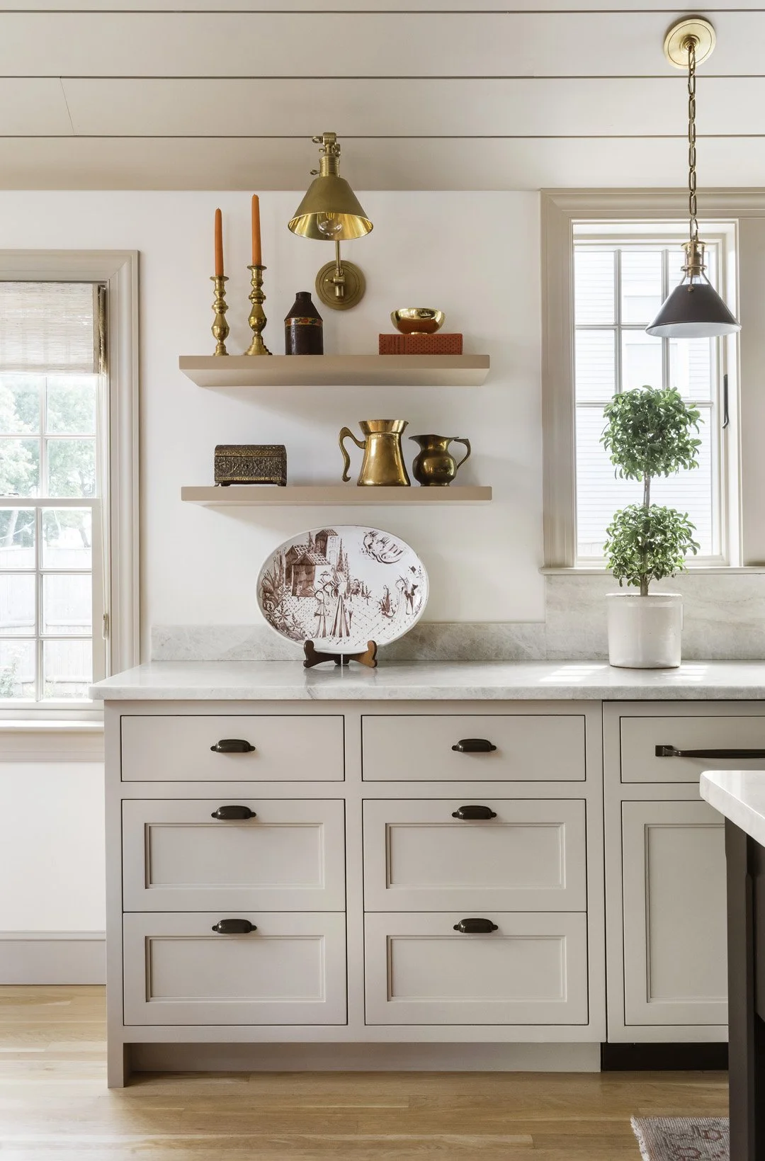 Sacris Design high end kitchen cabinetry with floating shelves, antiques and quartzite countertop, serving Portsmouth New Hampshire and Newburyport Massachusetts