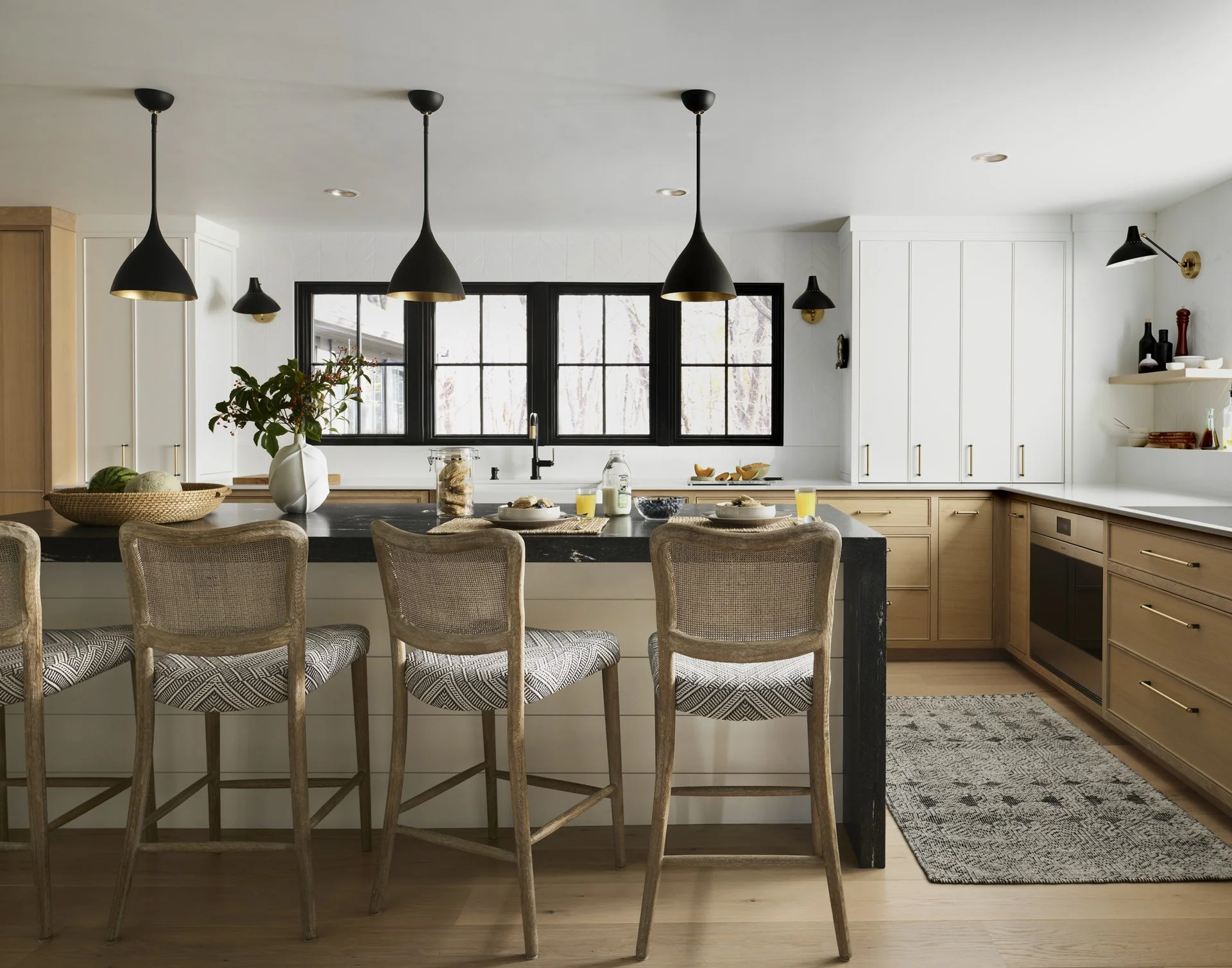 Sacris Design Merrimack Valley kitchen renovation with two-tone oak cabinetry and black granite waterfall island, North Andover Massachusetts