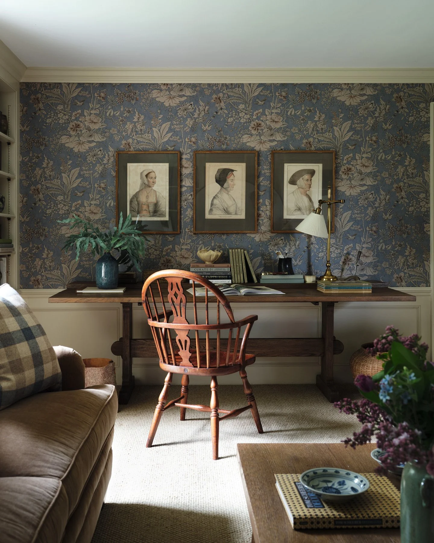 SACRIS library with blue floral wallcovering, antique trestle desk, Windsor armchair and framed Holbein portrait prints, Nashua New Hampshire