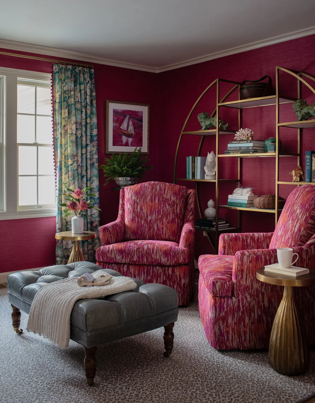 Sacris Design coastal New Hampshire sitting room with grasscloth walls, bold ikat upholstered chairs and brass arched etagere, New Castle Portsmouth NH