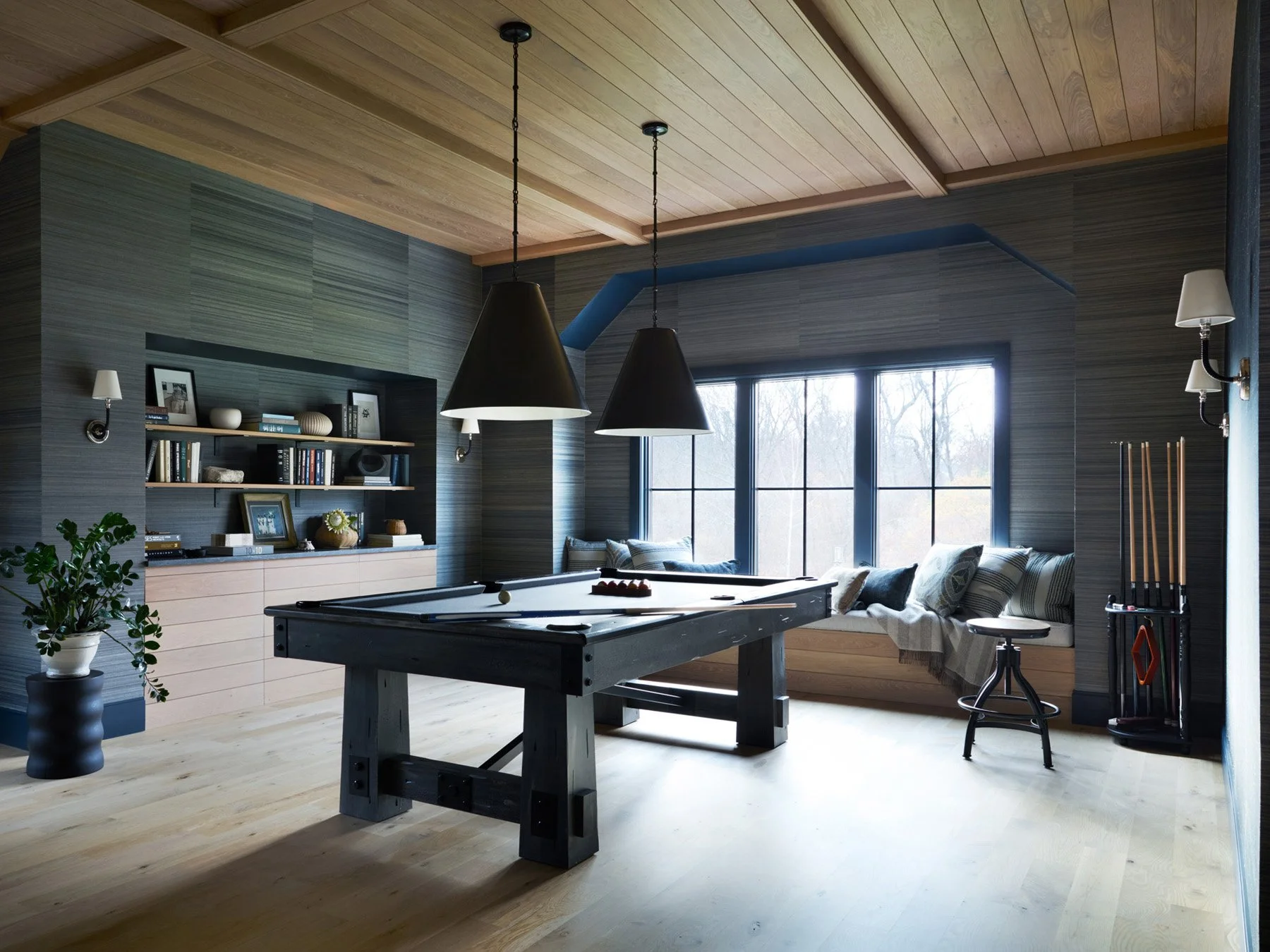 SACRIS great room billiards end with blackened wood table, Visual Comfort Goodman hanging pendants, window seat and Brewster grasscloth walls, North Andover Massachusetts