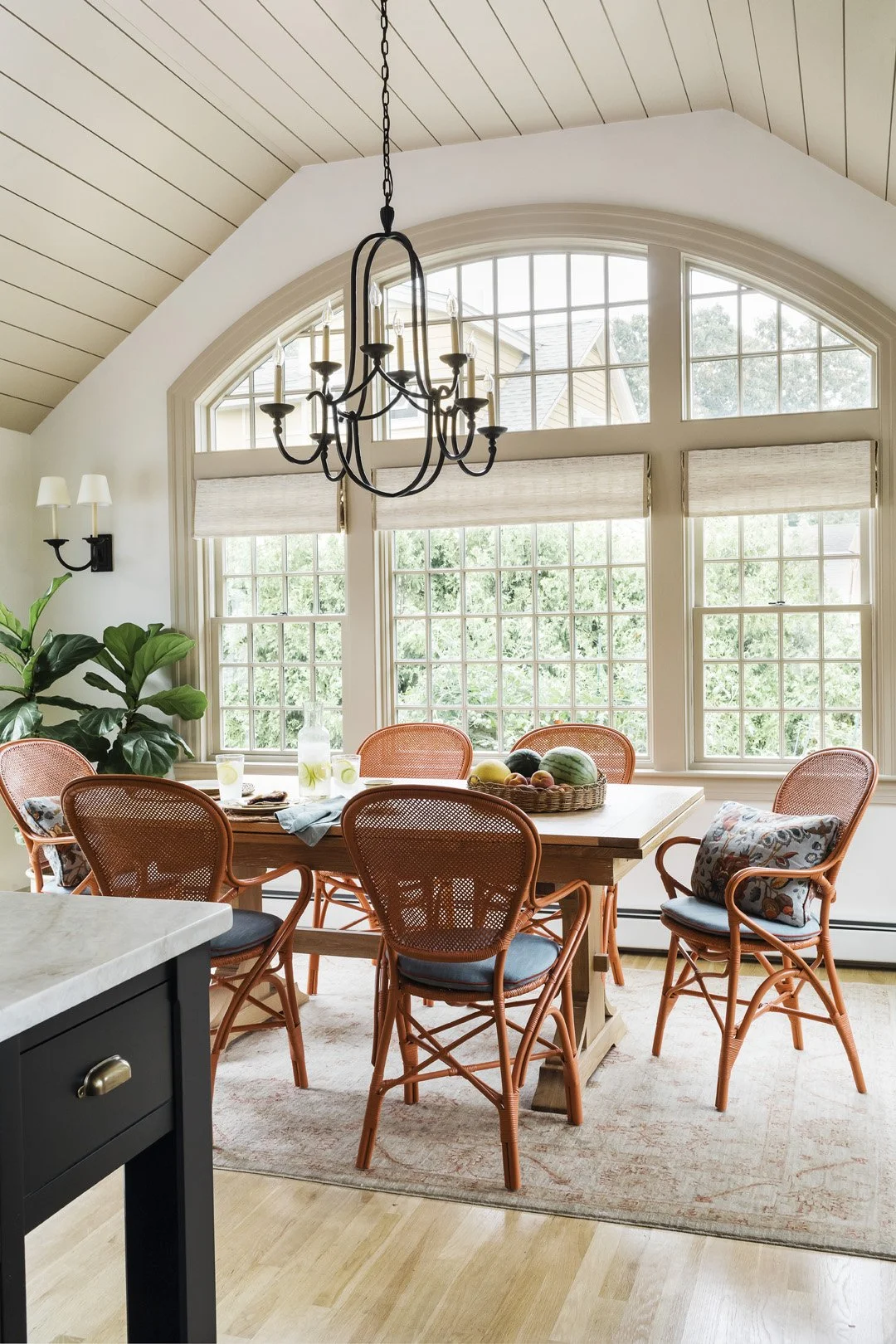 Sacris Design traditional interior design breakfast dining area with shiplap vaulted ceiling and painted rattan chairs, Newburyport Massachusetts