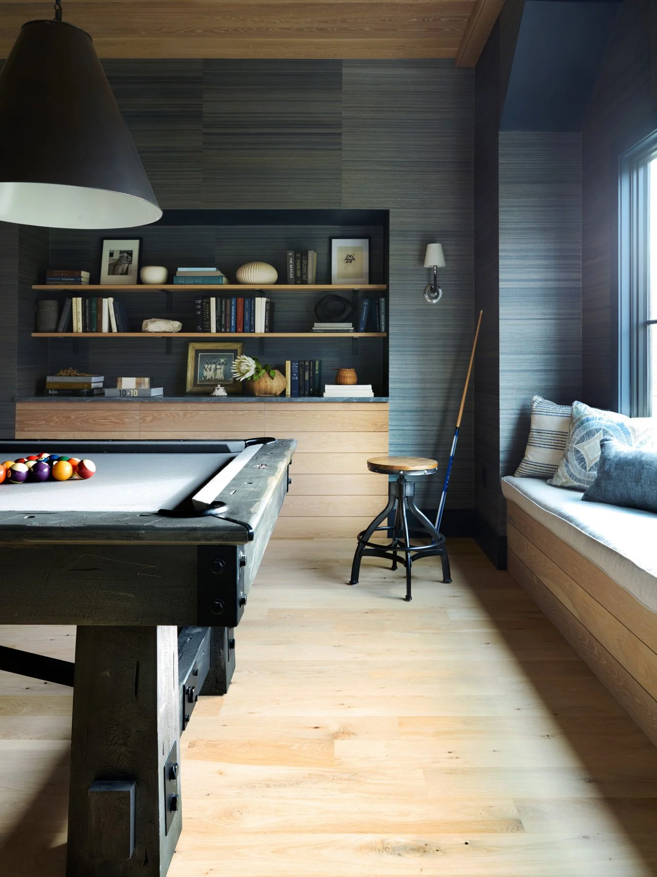 SACRIS billiards area with built-in window seat, white oak floors and Visual Comfort Goodman pendant, North Andover Massachusetts
