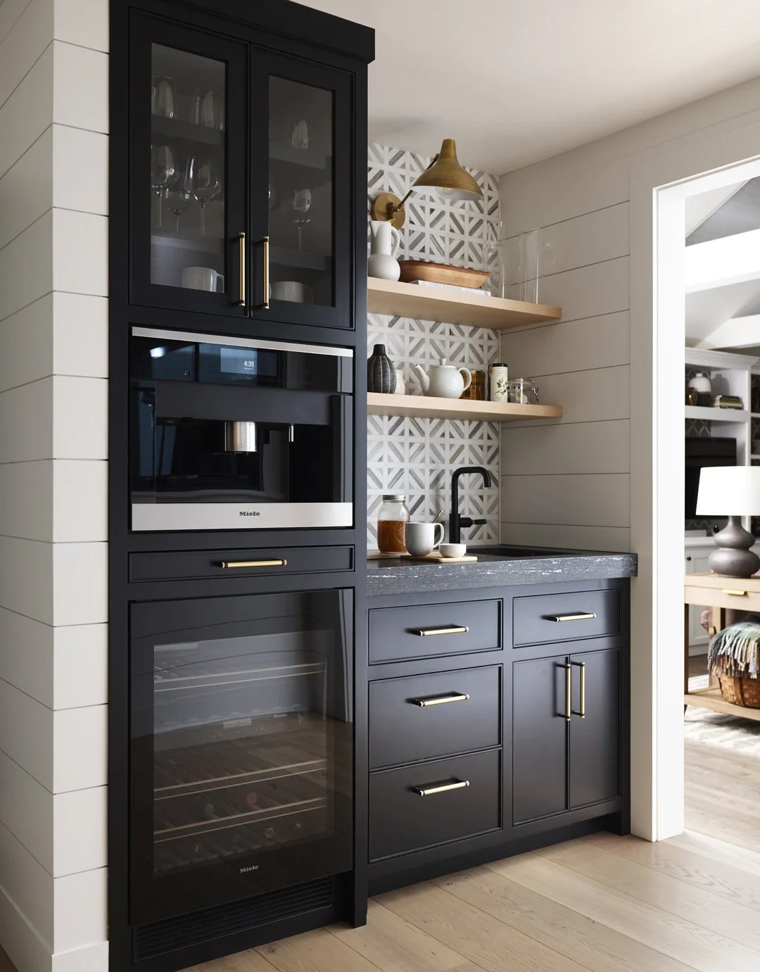 Sacris Design luxury coffee bar with black cabinetry, Miele coffee station, geometric marble backsplash North Shore Massachusetts