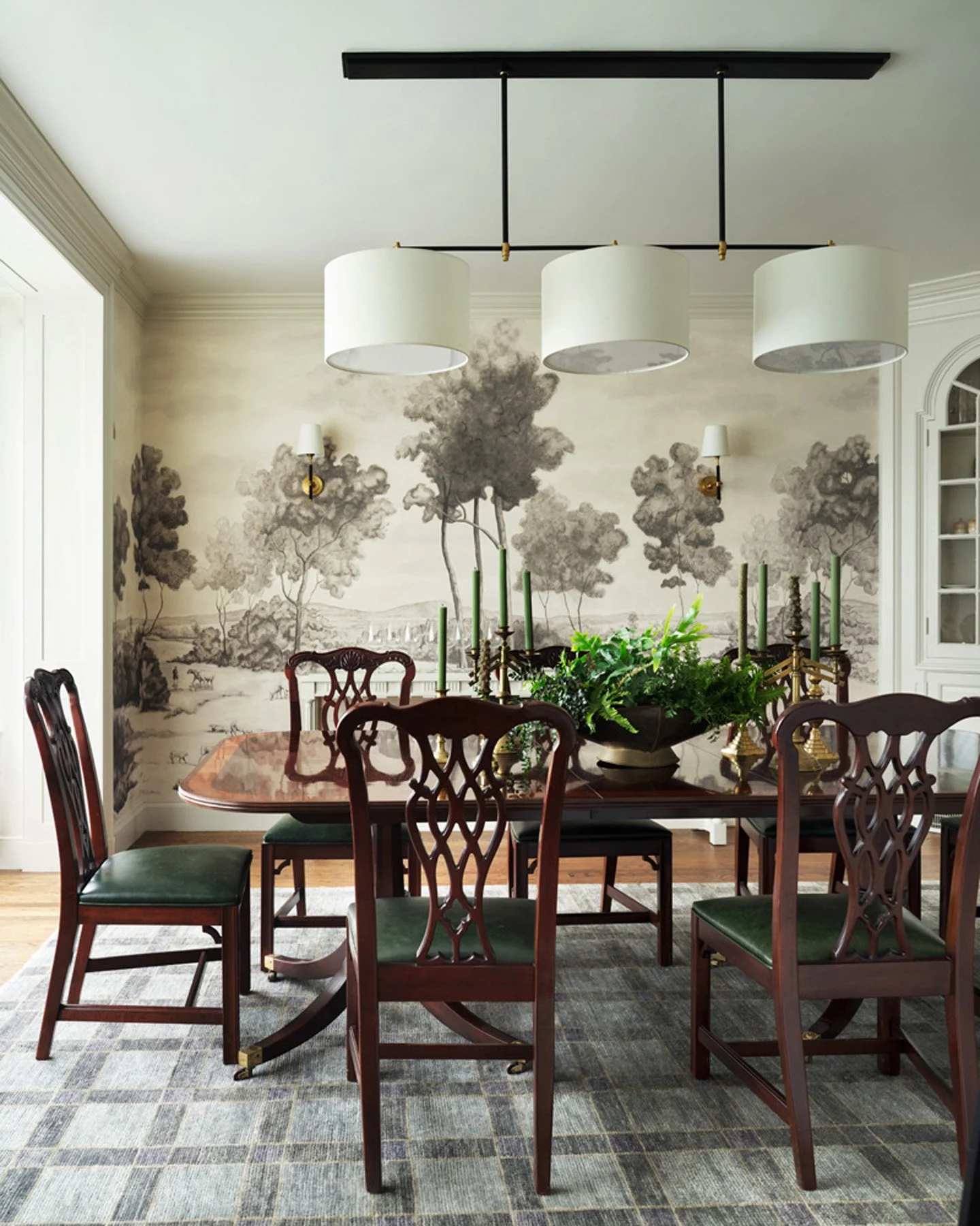 SACRIS dining room with hand-painted grisaille landscape mural, mahogany Chippendale chairs in green leather and original china cupboards, Nashua New Hampshire