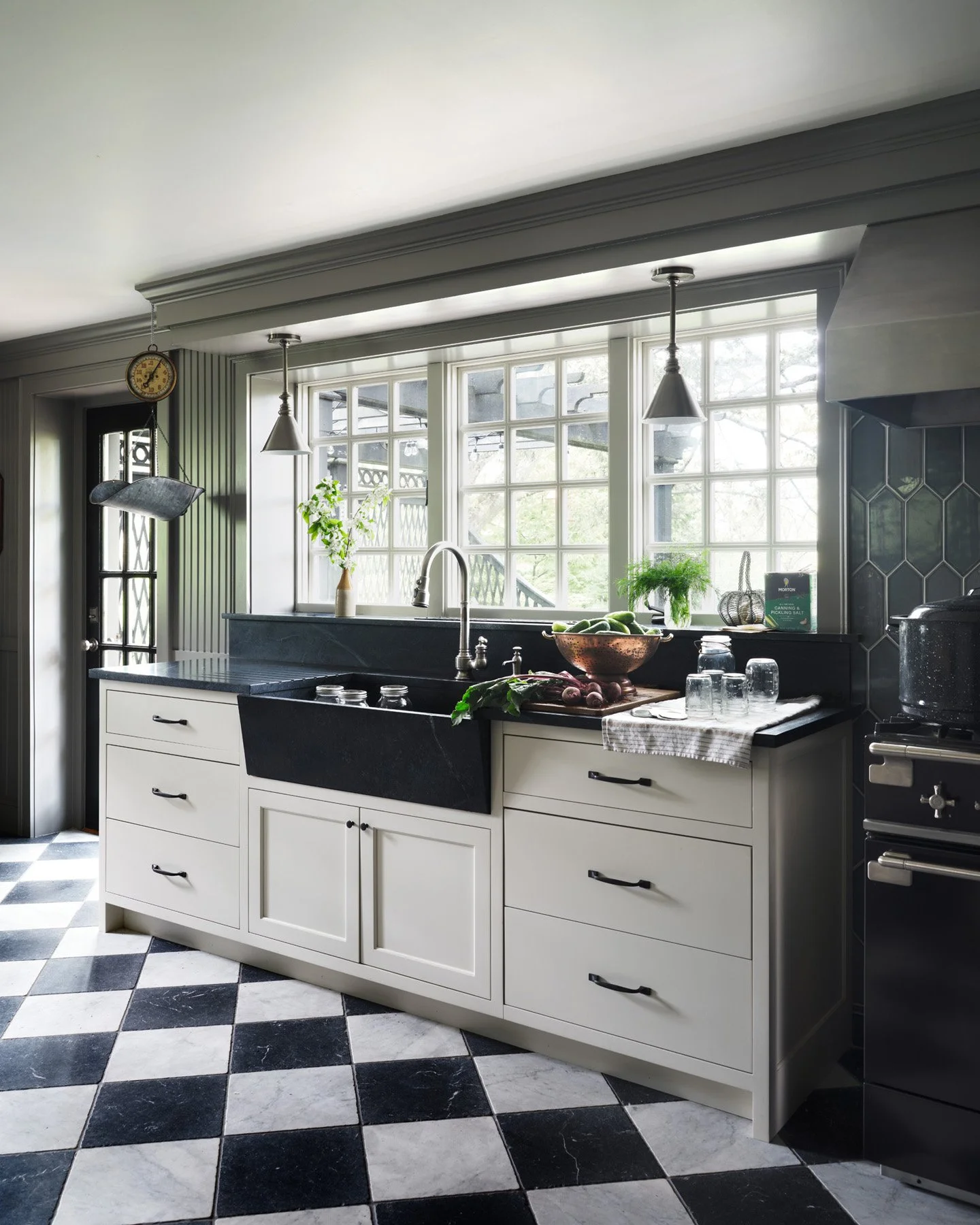 SACRIS Project Studio with custom apron-front soapstone sink, nickel pendants and marble checkerboard floor, Nashua New Hampshire