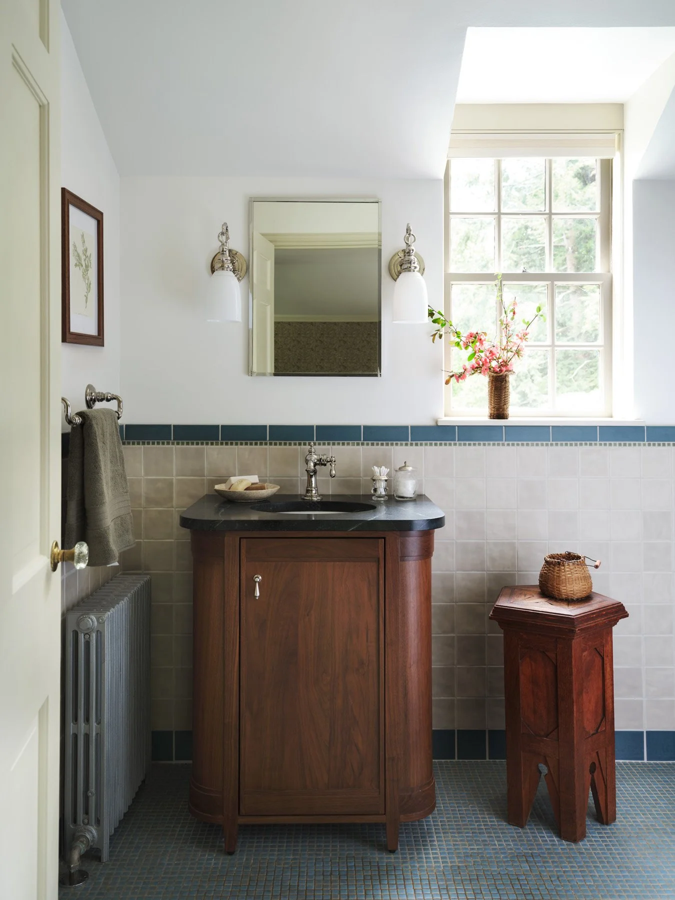 SACRIS bath with curved walnut vanity, soapstone countertop, blue and taupe tile wainscot and blue mosaic floor, Nashua New Hampshire