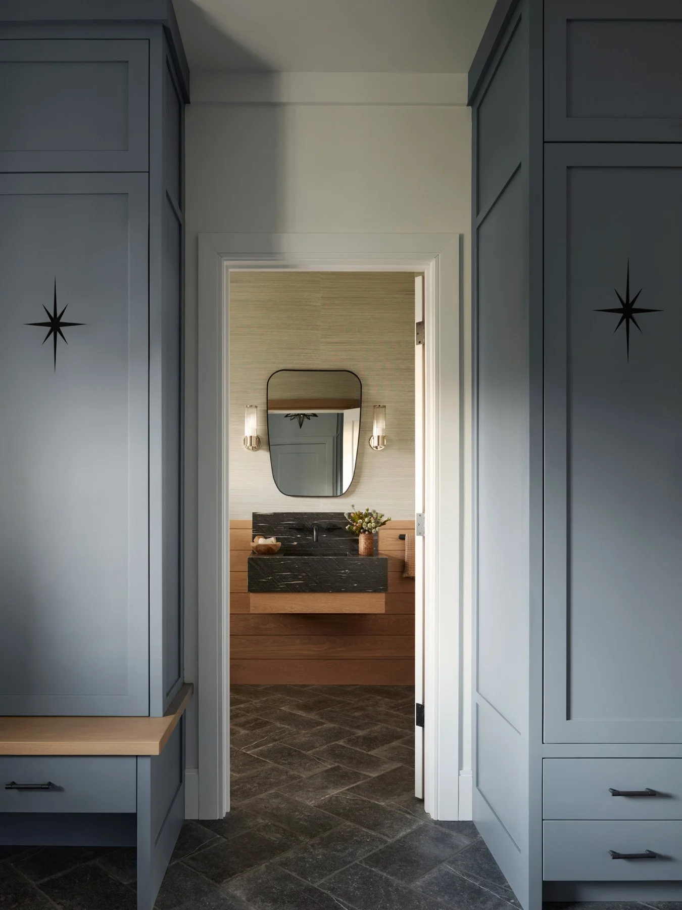 SACRIS powder room with custom floating granite sink, white oak shiplap wall, Phillip Jeffries Bermuda Hemp wallcovering and Visual Comfort fluted sconces, North Andover Massachusetts