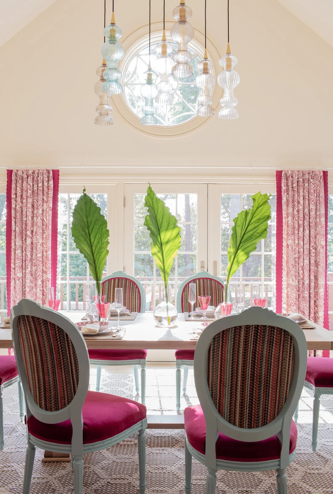SACRIS Portsmouth New Hampshire dining room wide angle with vaulted ceiling, bull's eye round window, glass pendant cluster and French doors to deck, New Castle NH
