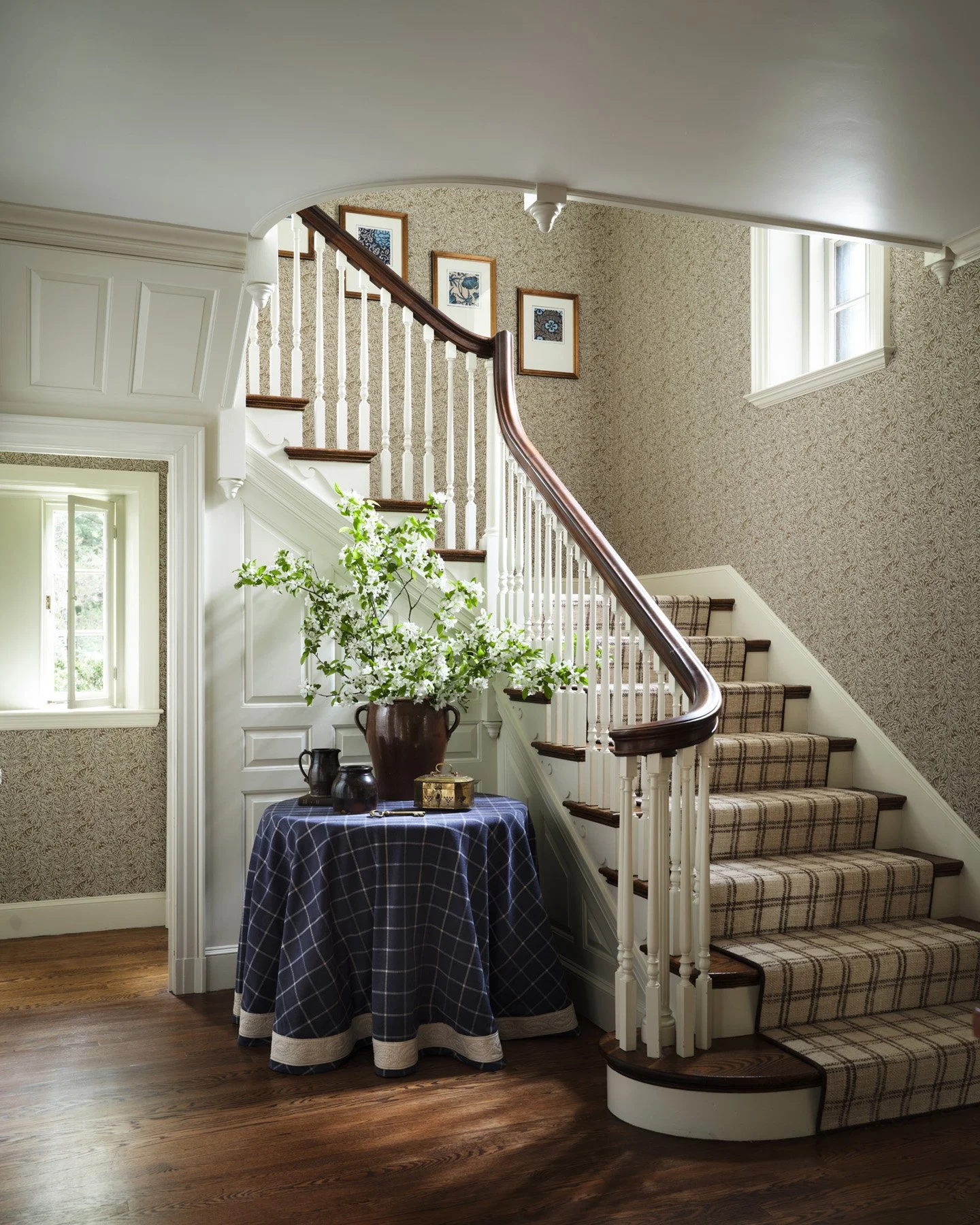 SACRIS stair hall with willow-pattern wallcovering, plaid wool stair runner, custom plaid table skirt and original turned balusters, Nashua New Hampshire