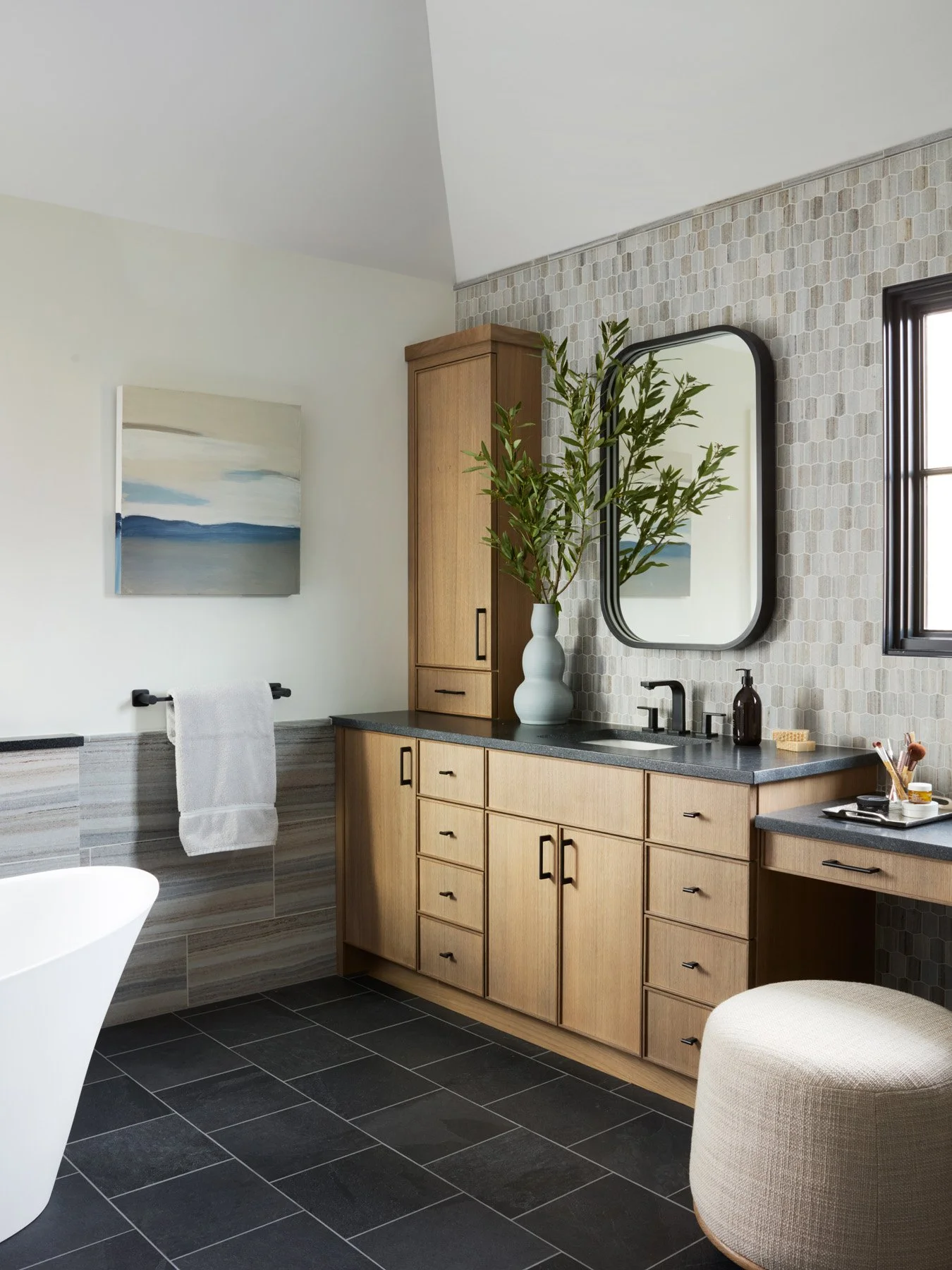SACRIS primary bath with white oak vanity, honed granite countertop, elongated hexagon blue velvet marble mosaic and freestanding tub, North Andover Massachusetts