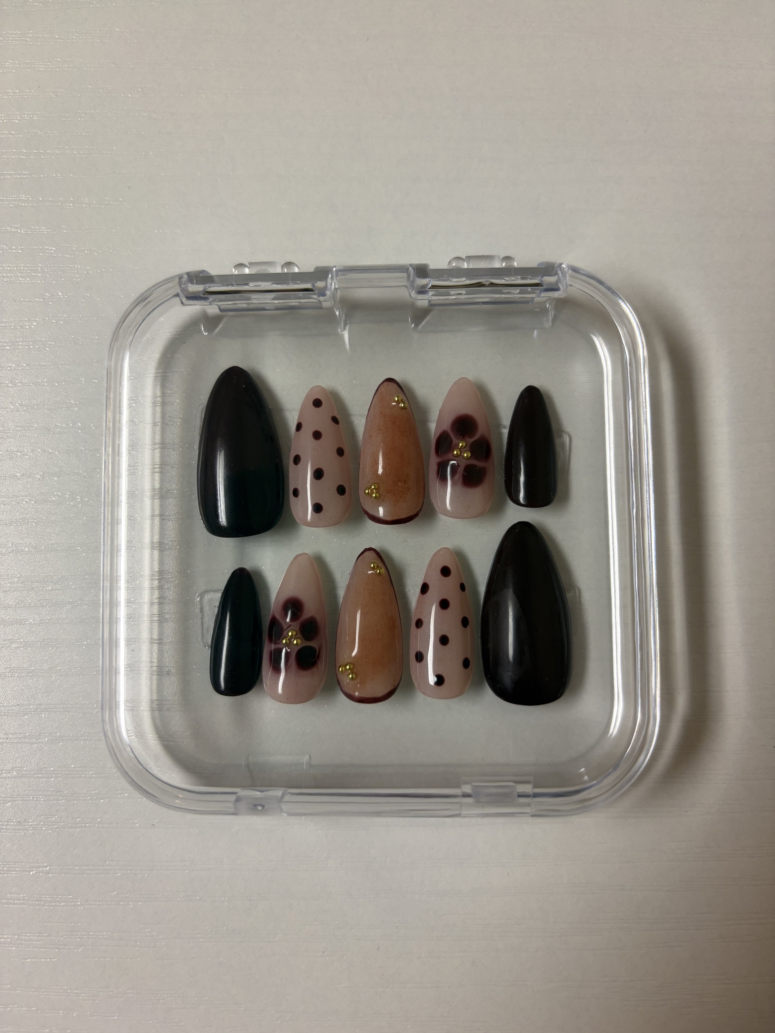 Brown floral press ons.jpeg