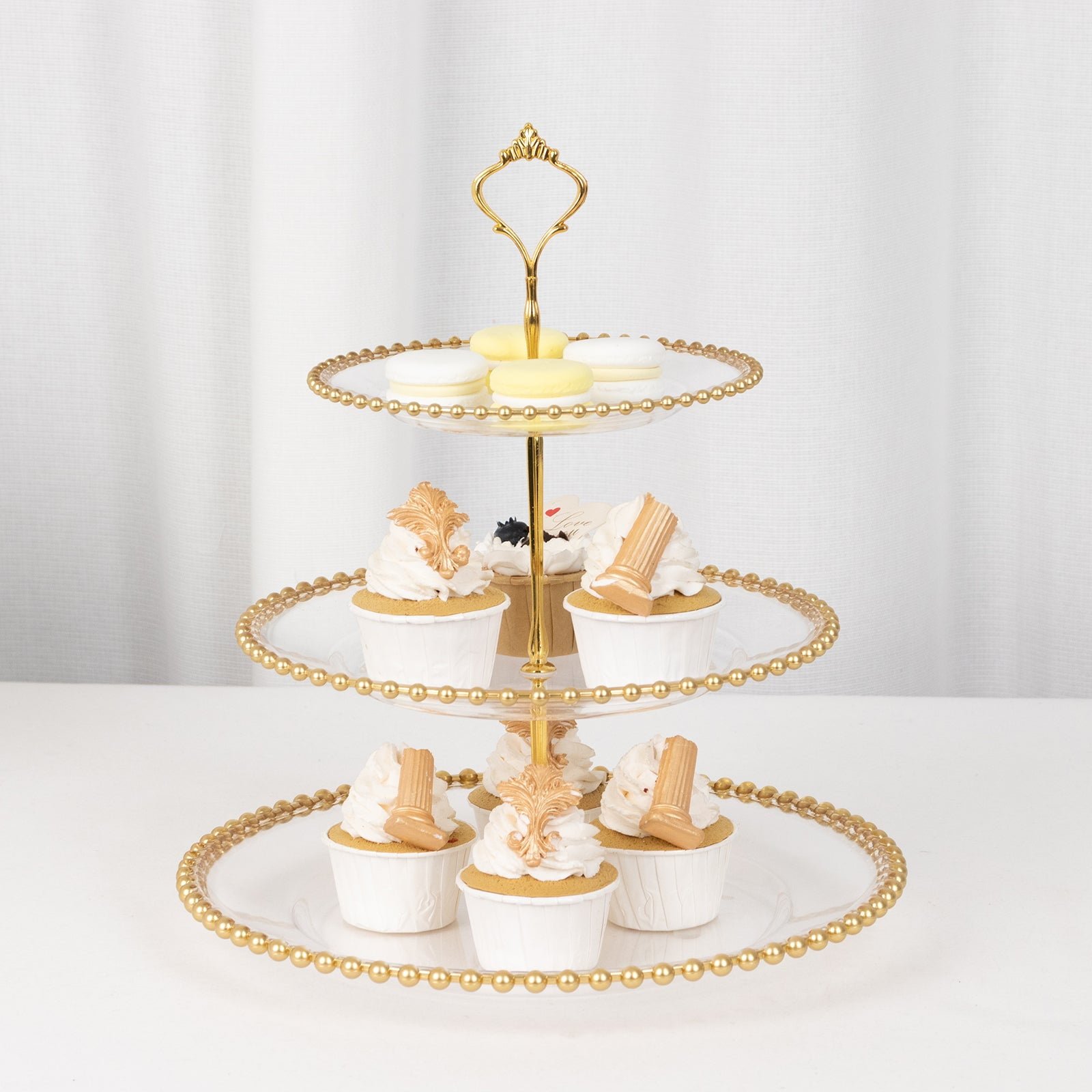 Efavormart-Clear-3-Tier-Round-Plastic-Cupcake-Tower-Stand-with-Gold-Beaded-Rim-Dessert-Display-Tea-Party-Serving-Platter-With-Top-Handle-14-Tall_aae91f7c-c18d-4f7b-9761-16f512cc8e9a.abf3a04e2211889ae8c4445878e269d9.jpeg