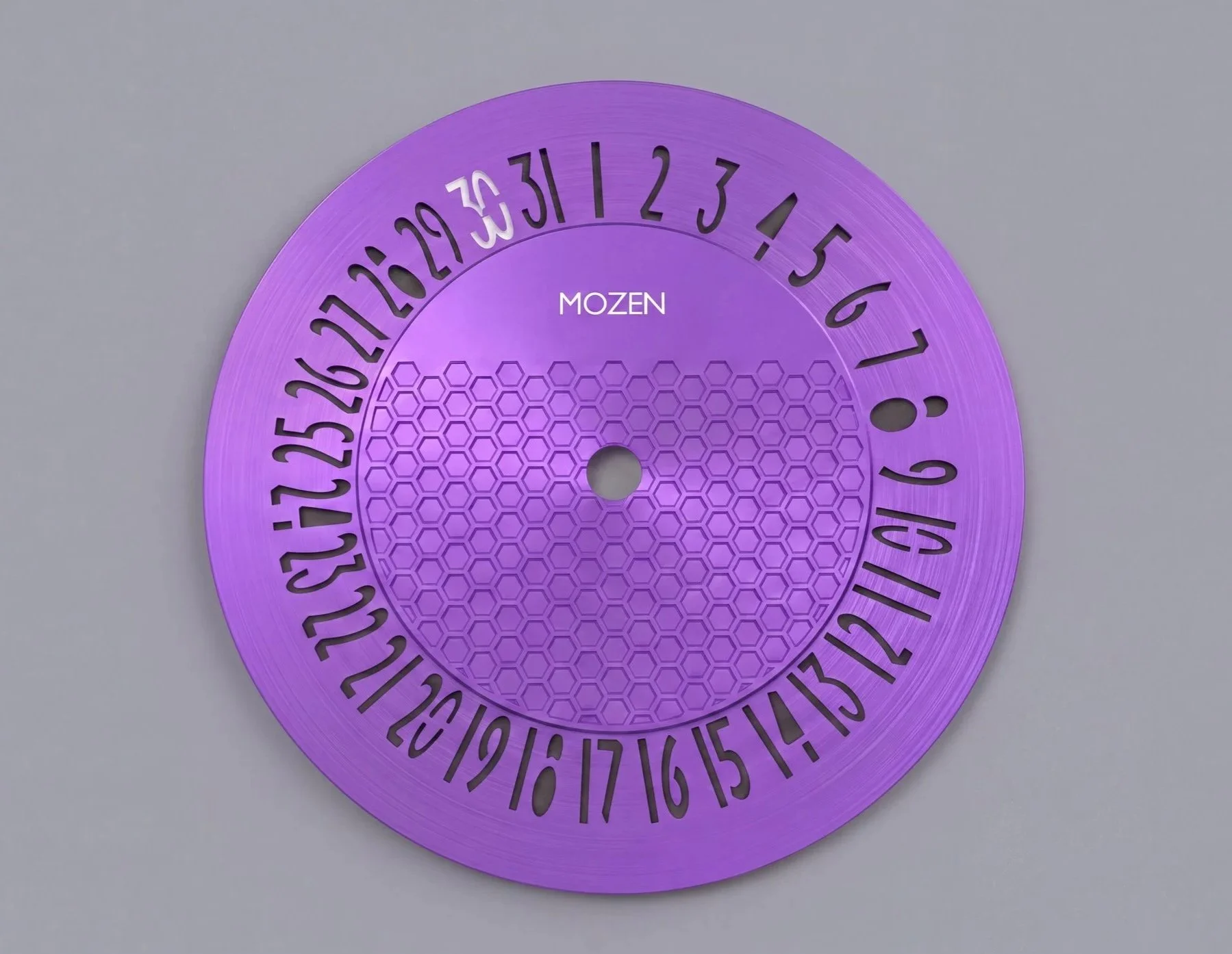 A purple circular wheel with numbered slices from 1 to 31, used for selecting a date, with the word 'MOZEN' in the center and a hexagonal pattern background.