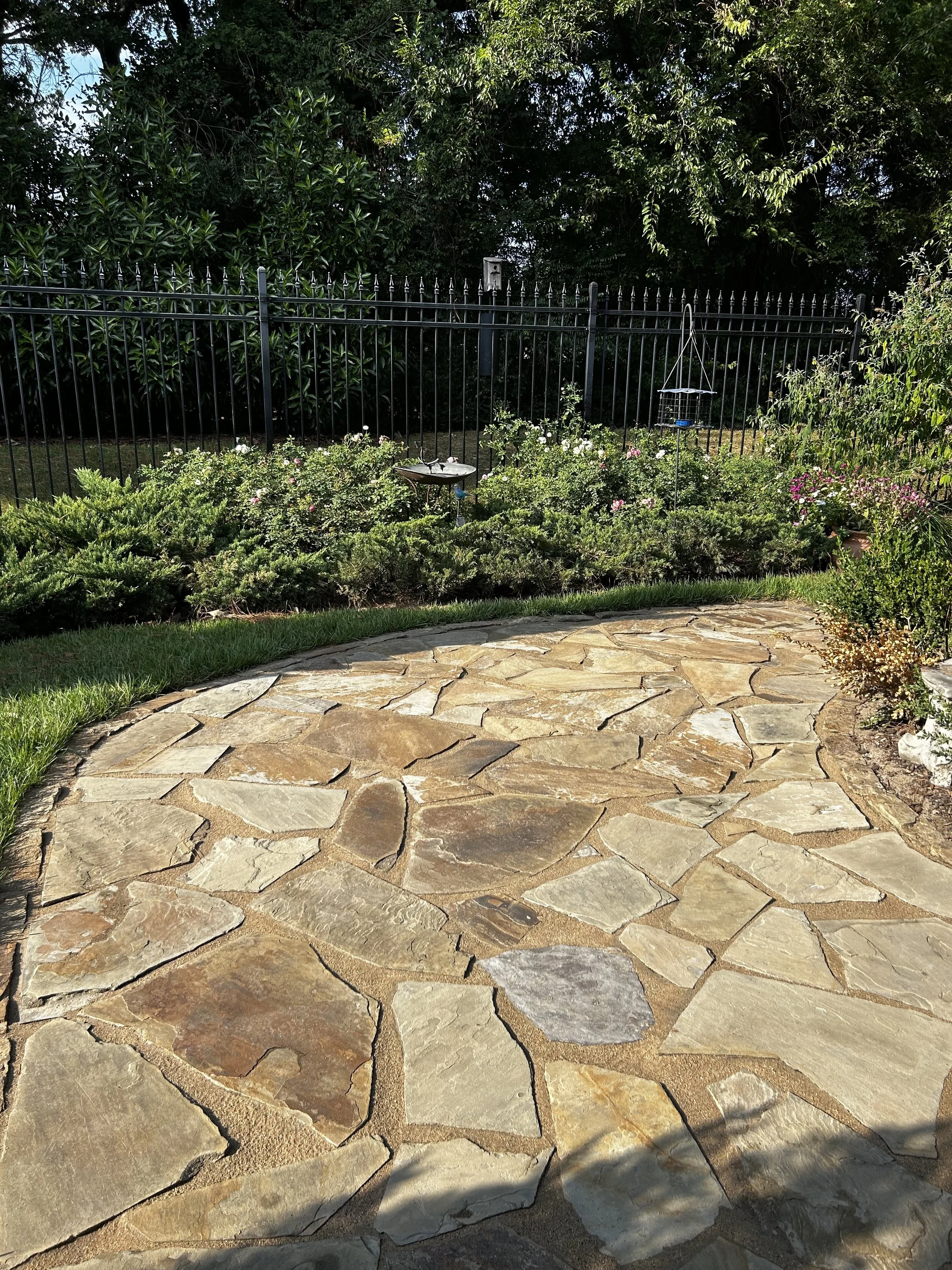 After - Stones were power washed and new poly sand was installed.