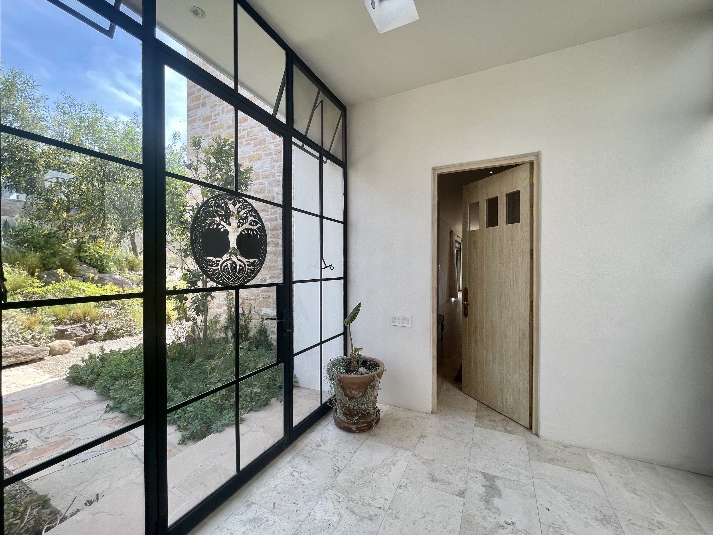 iron work entryway.jpeg